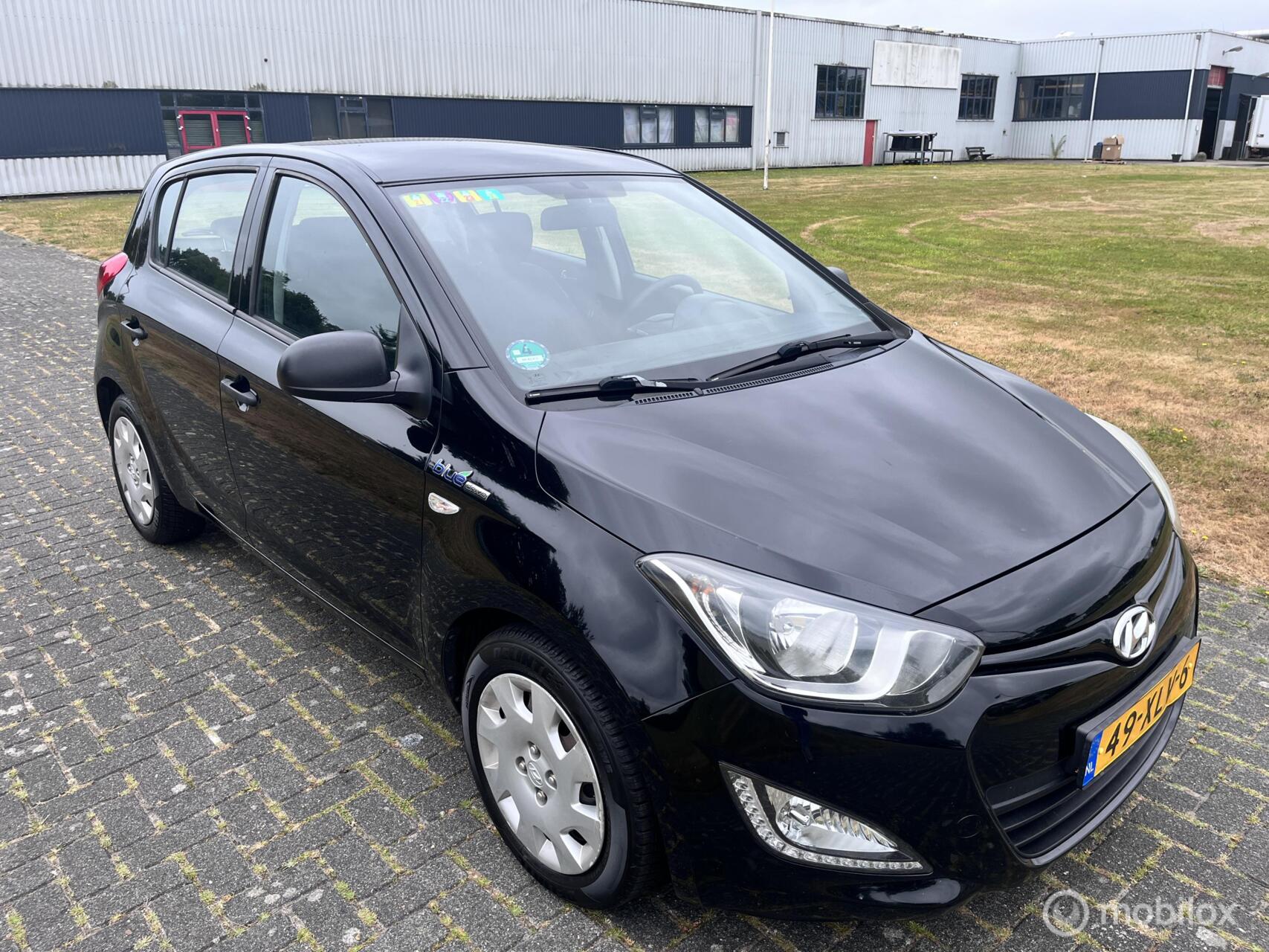Hyundai I20 1.2i Business Edition Blue drive / Airco / APK / 2012 - voorkant