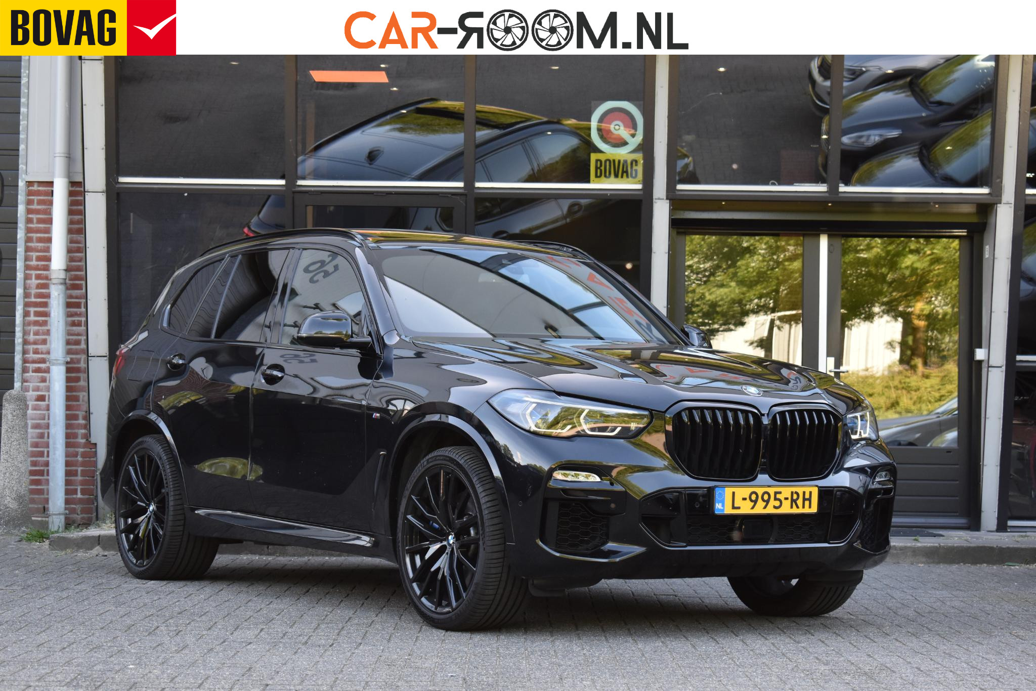 BMW X5 M50i High Executive 2021 - voorkant