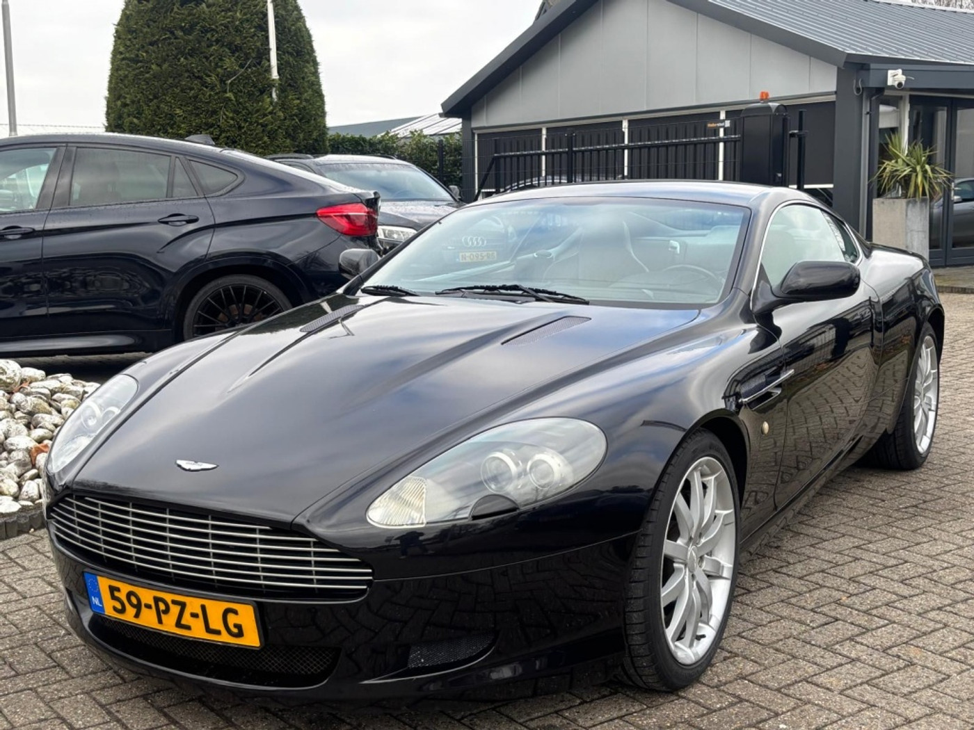 Aston Martin Db9 5.9 V12 458PK Touchtronic 2005 Zwart NL auto 2005 - voorkant