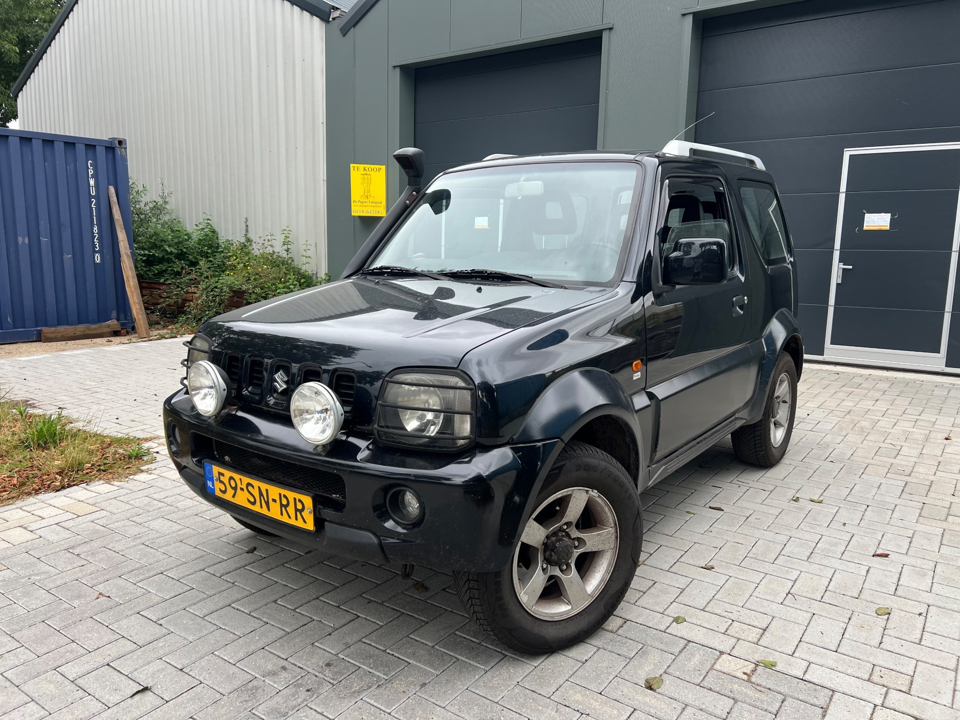 Suzuki Jimny 1.3 Exclusive 4x4 Airco 2006 - voorkant