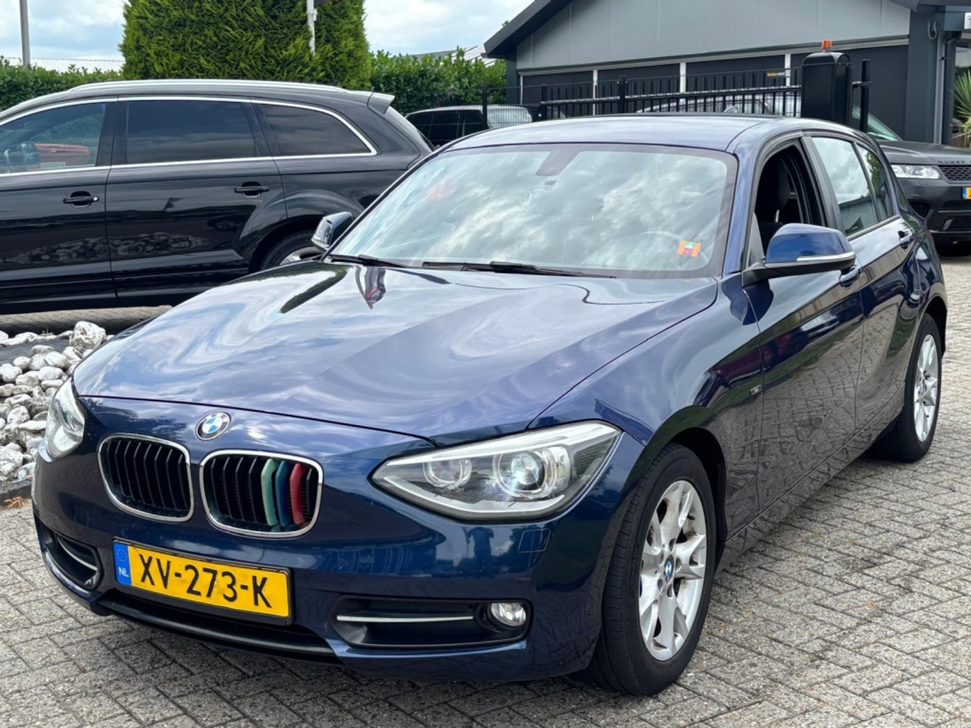 BMW 1er Reihe 116I 2011 Benzine 5-Deurs Nieuw Model Xenon 2011 - voorkant