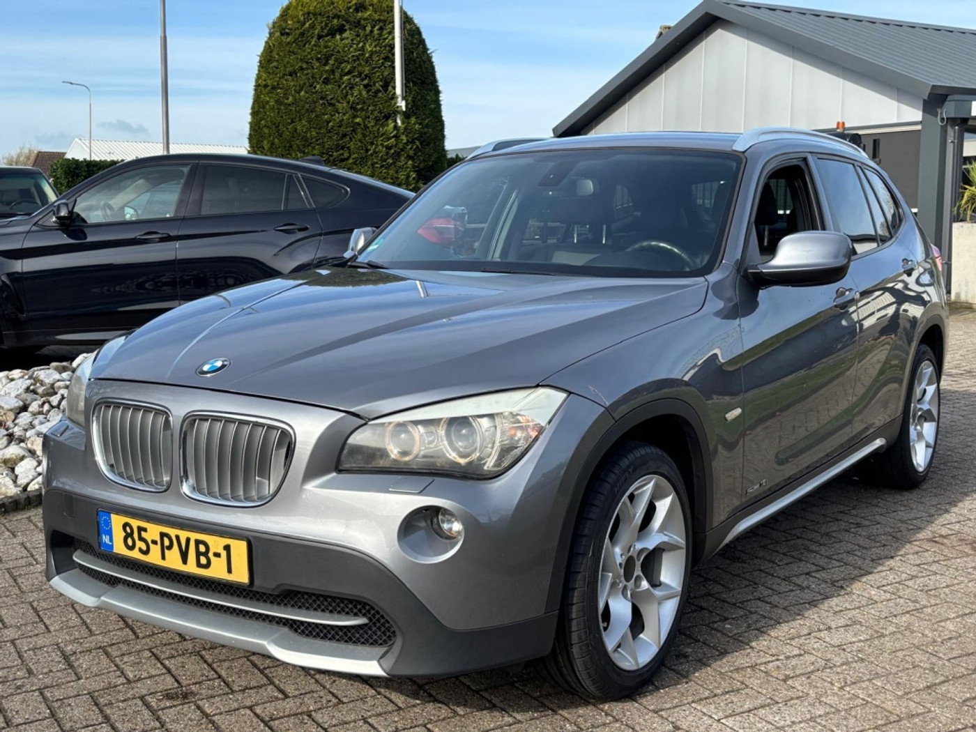 BMW X1 sDrive 18i 1.8i Executive Sport 2011 Leer Xenon NL Auto 2011 - voorkant