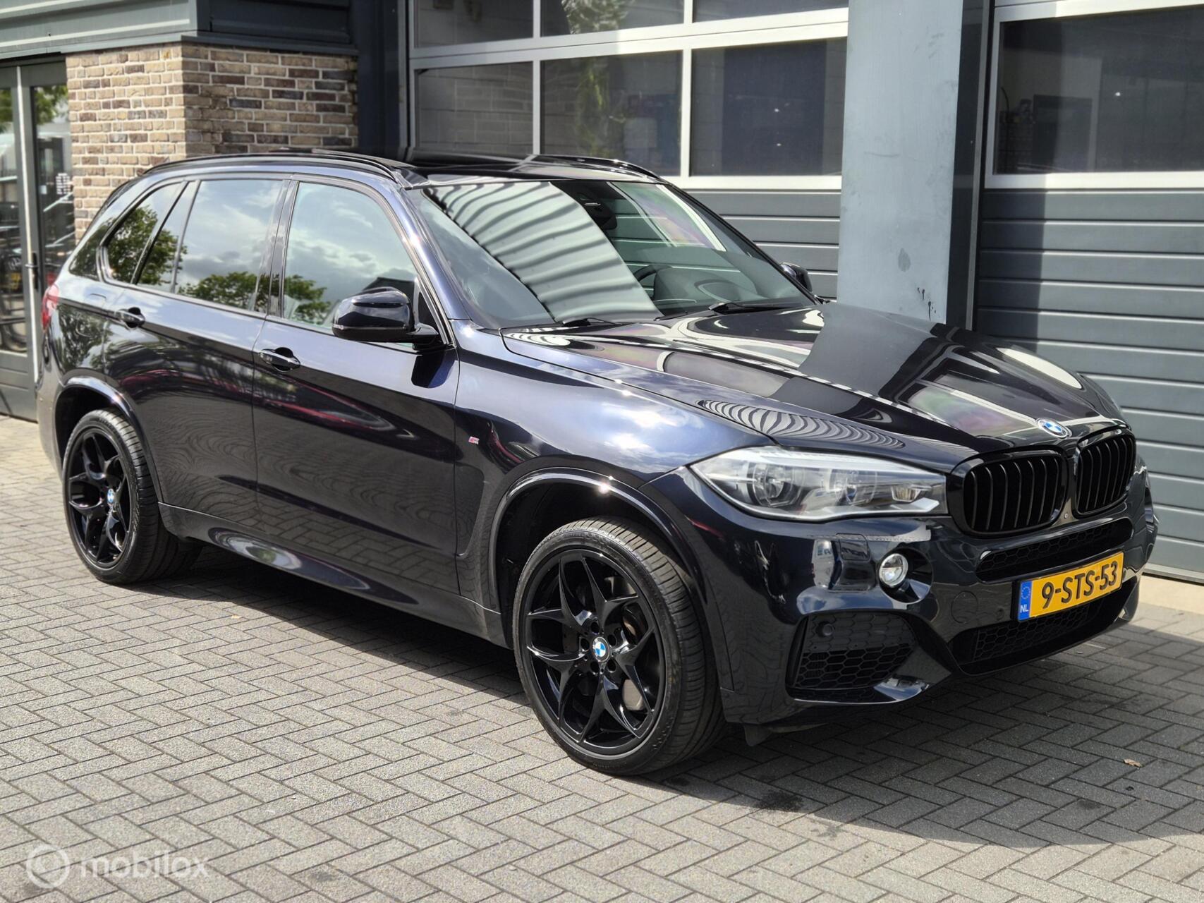 Foto van BMW X5 Xdrive50i