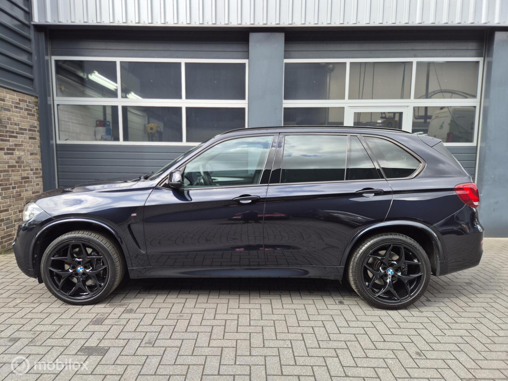 Foto van BMW X5 Xdrive50i
