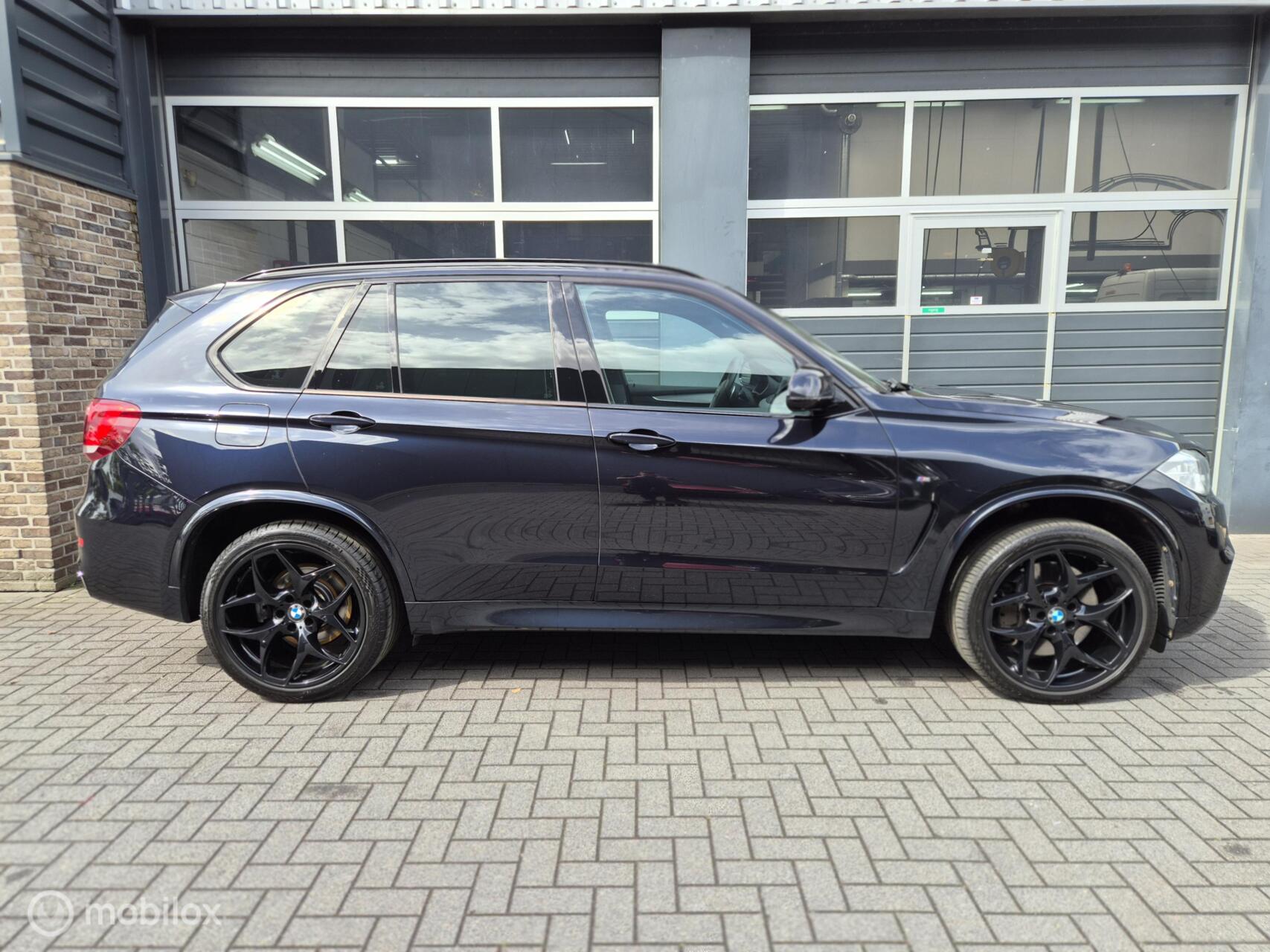 Foto van BMW X5 Xdrive50i