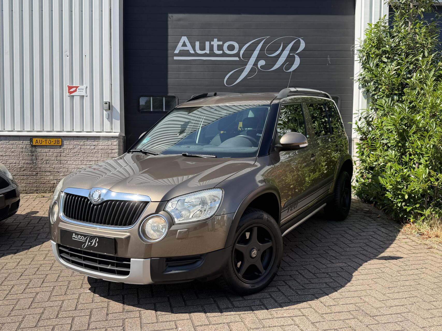 Skoda Yeti 1.2 TSI ACTIVE | TREKHAAK | ALL-SEASON | APK 2027 2010 - voorkant