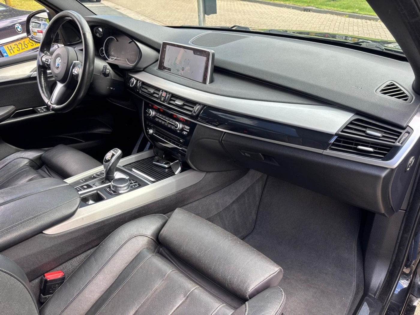 Foto van BMW X5 M50d