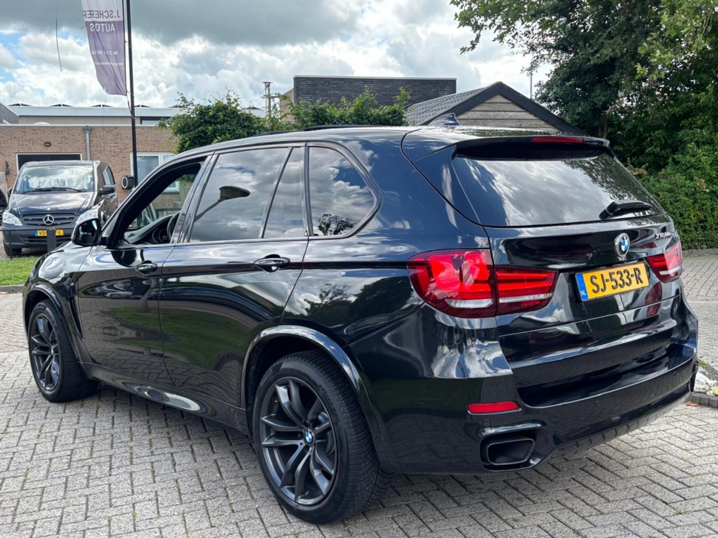 Foto van BMW X5 M50d