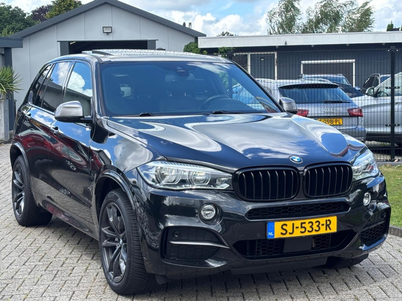 Foto van BMW X5 M50d
