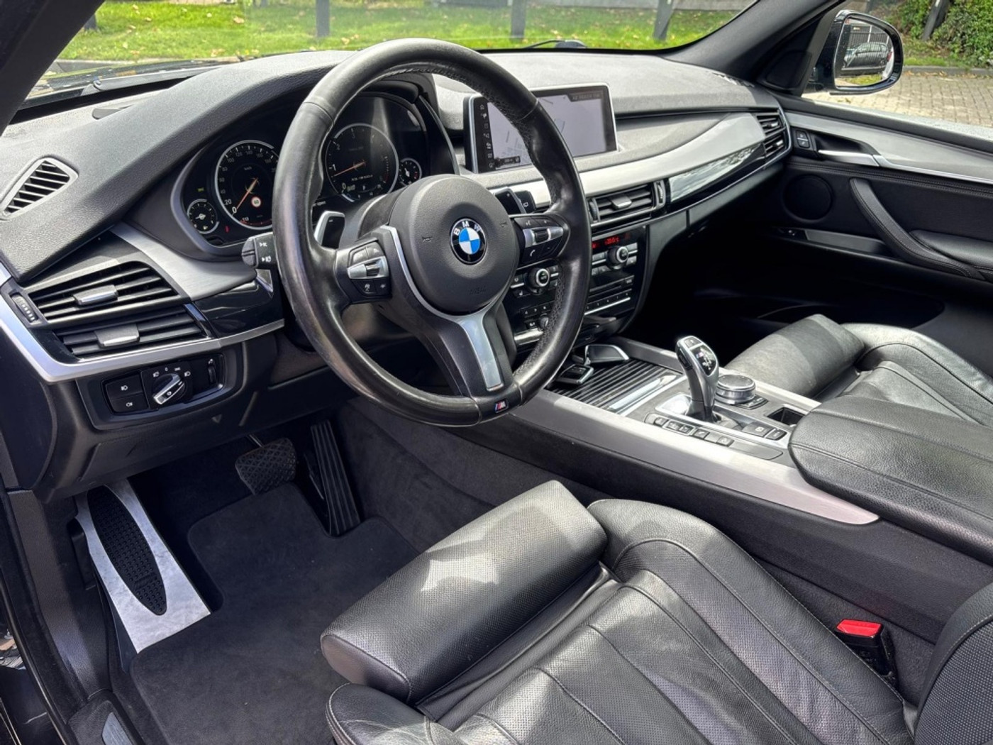 Foto van BMW X5 M50d