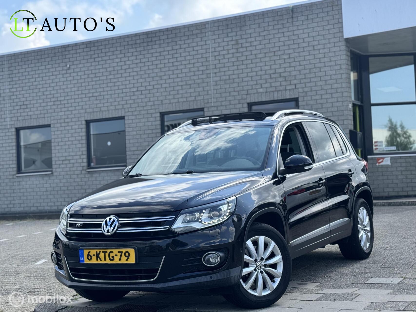 Volkswagen Tiguan 1.4 TSI Sport&Style|Pano Carplay Xenon NAP 2013 - voorkant