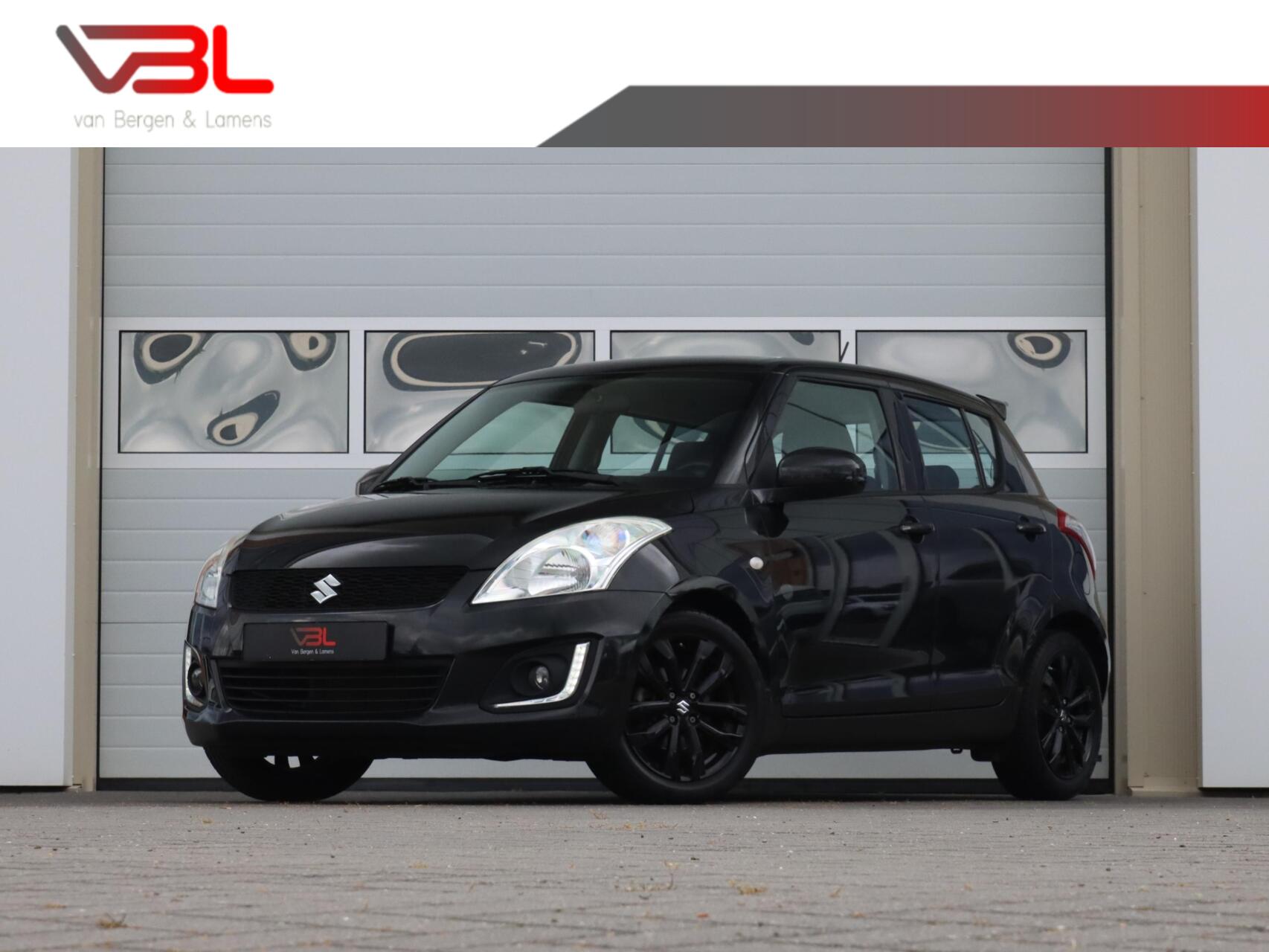 Suzuki Swift 1.2 90PK Bandit 5Drs | Unieke km-stand | 1e eigenaar | 2016 - voorkant