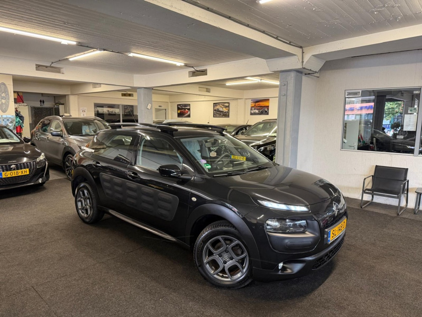 Citroen C4 Cactus 1.2 PureTech Shine*Automaat*Camera*Navi*Velgen 2016 - voorkant