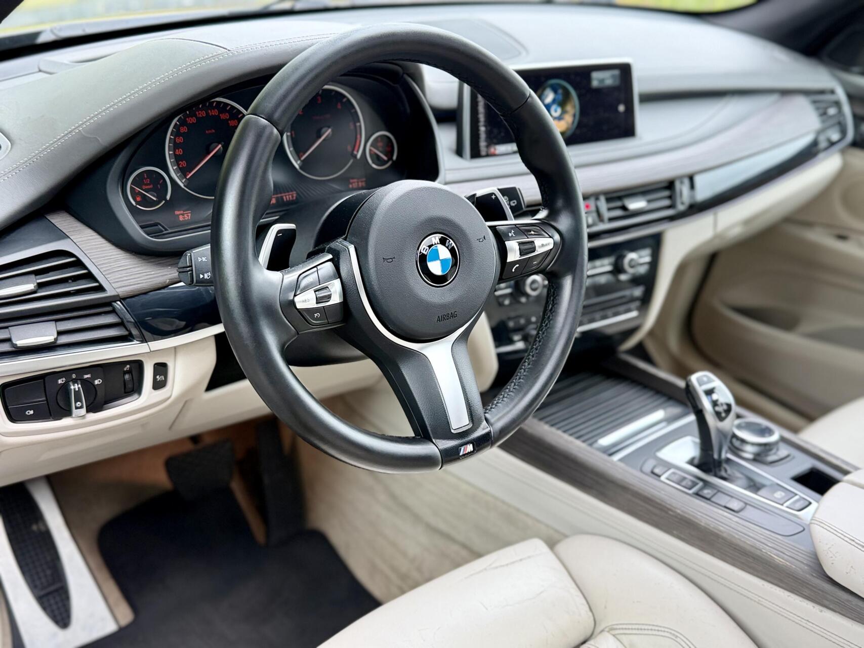Foto van BMW X5 M50d