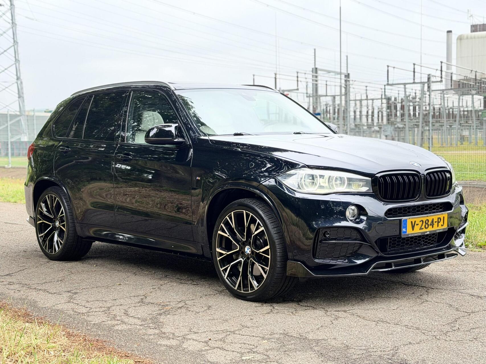 Foto van BMW X5 M50d