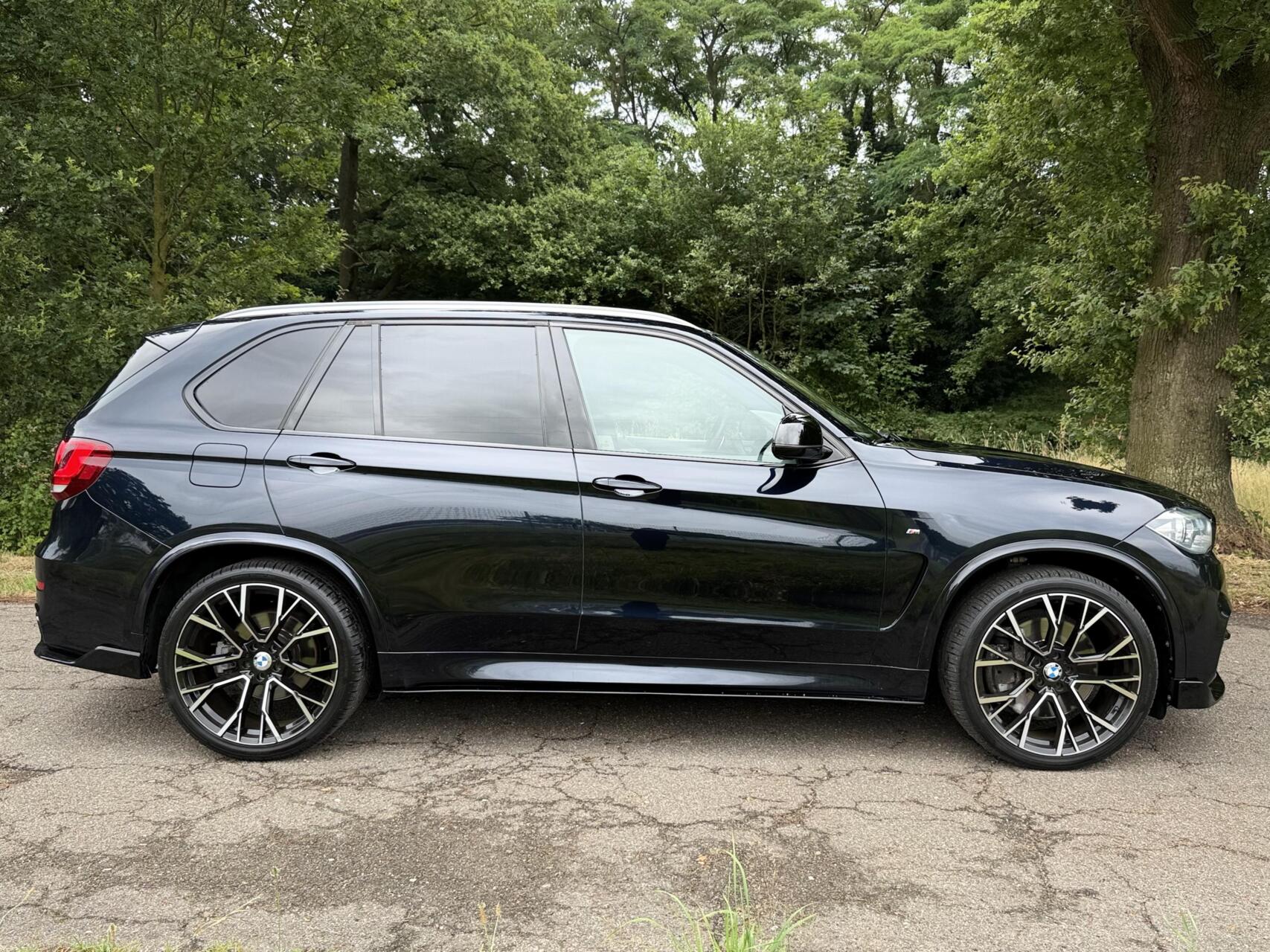 Foto van BMW X5 M50d