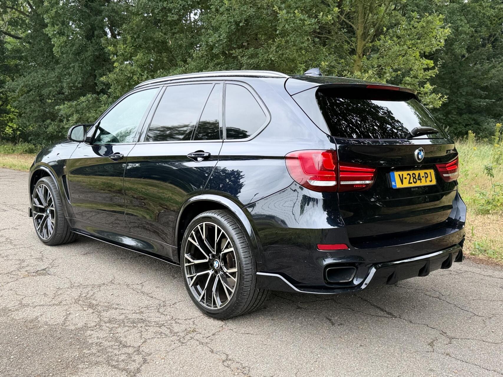 Foto van BMW X5 M50d