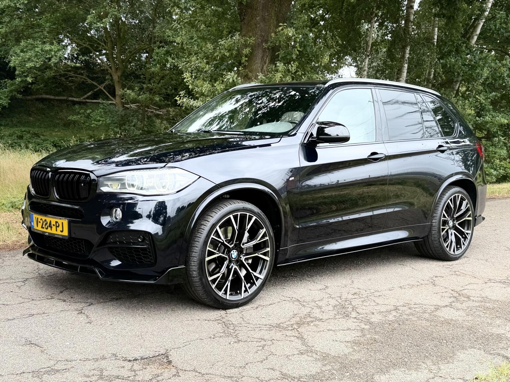 Foto van BMW X5 M50d