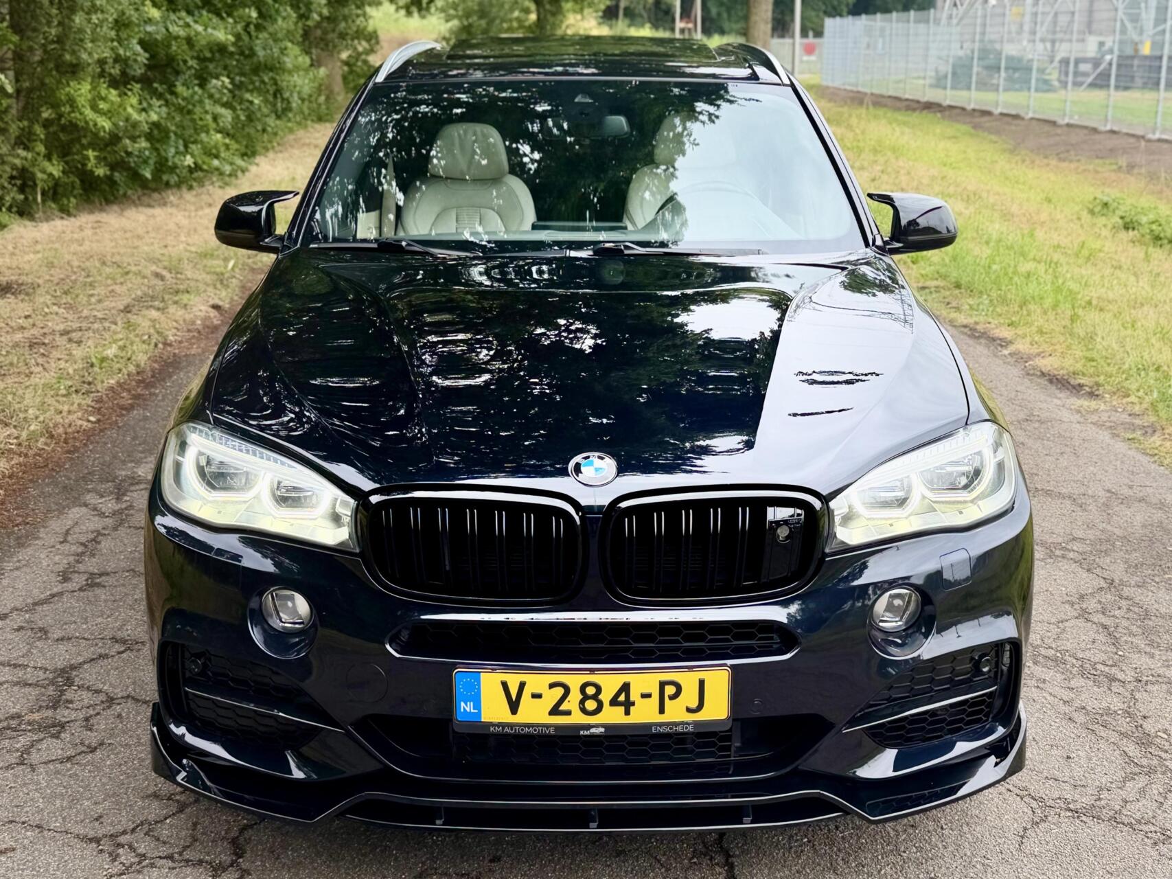 Foto van BMW X5 M50d
