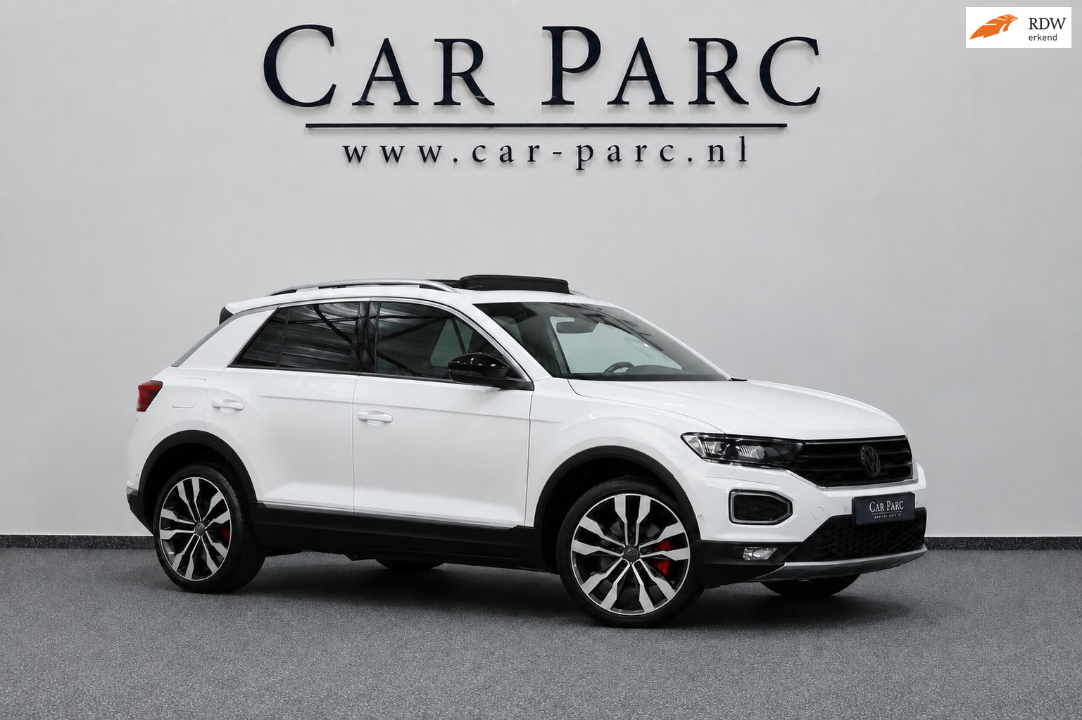 Volkswagen T-roc 2.0 TSI 4Motion R-LINE LED/VIRTUAL/PANO/HALF LEDER+S.VERWARMING/19" LMV/PDC/LINE/ACC/ECC/12 MND GARANTIE! 2018 - voorkant