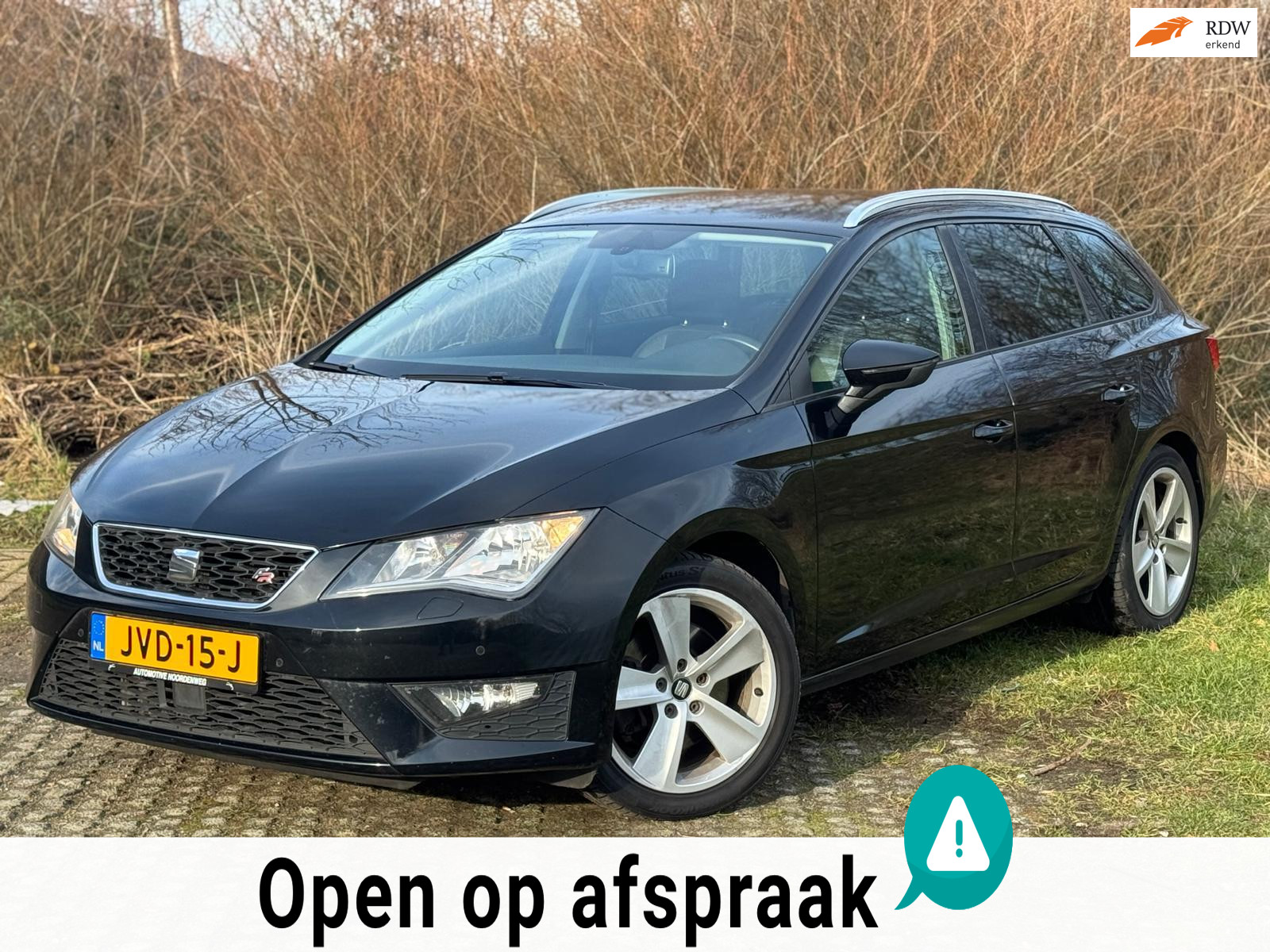 Seat Leon ST 1.8 TSI FR Business / AUTOMAAT / NAVI / STOELVW 2014 - voorkant