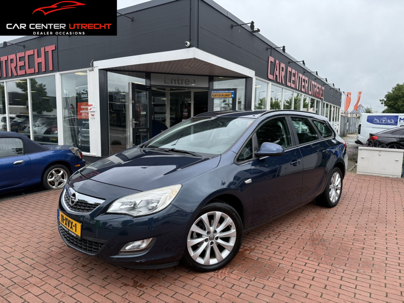 Opel Astra Sports Tourer 1.4 Turbo Edition | trekhaak | airco | navi | 6vers | 2012 - voorkant