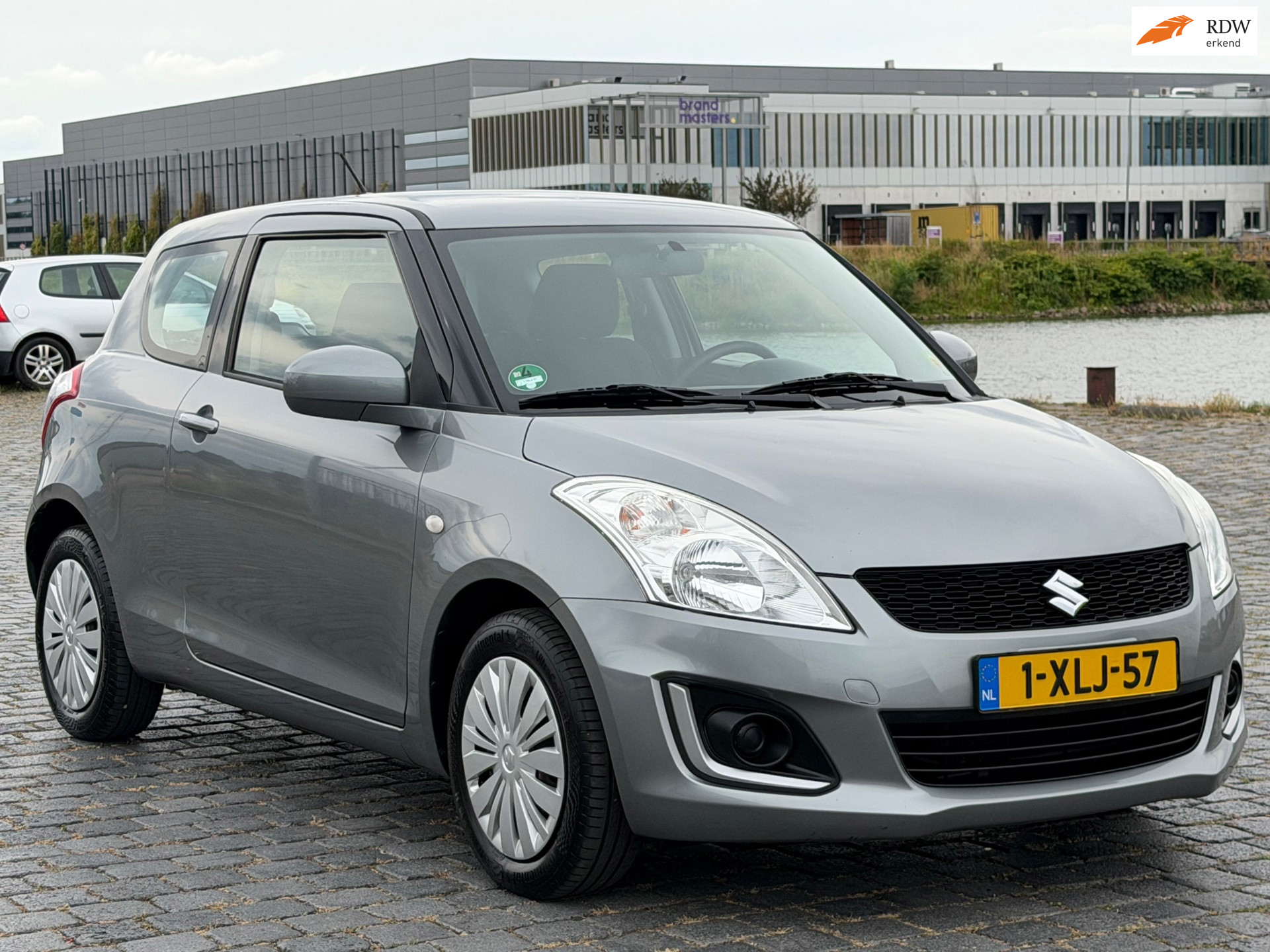 Suzuki Swift 1.2 Base EASSS AIRCO APK NAP 2014 - voorkant