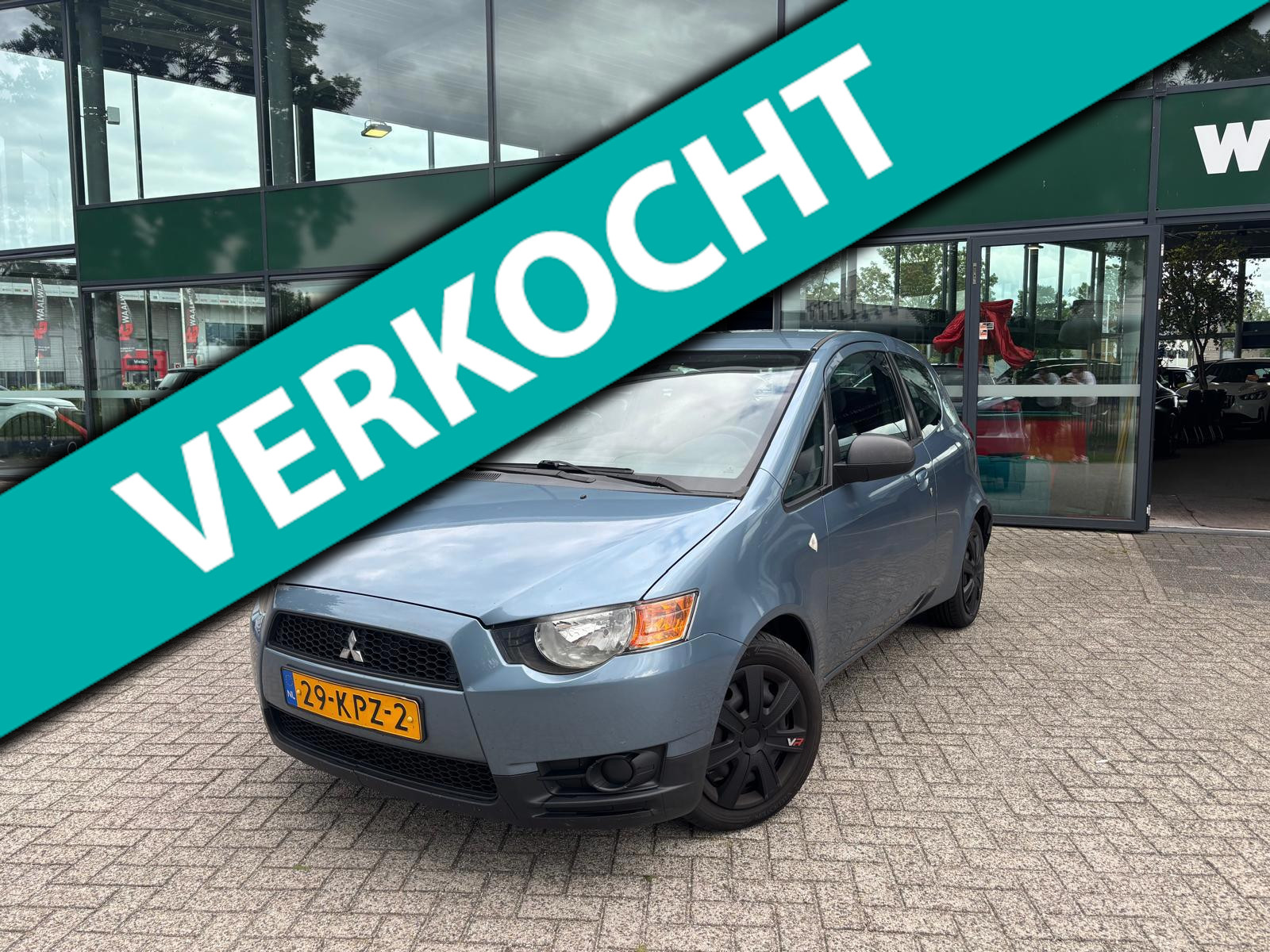 Mitsubishi Mitsubishi Colt 1.1 Edition One | LAGE KM! | AIRCO | NL-AUTO | GOED ONDERHOUD | 2010 - voorkant