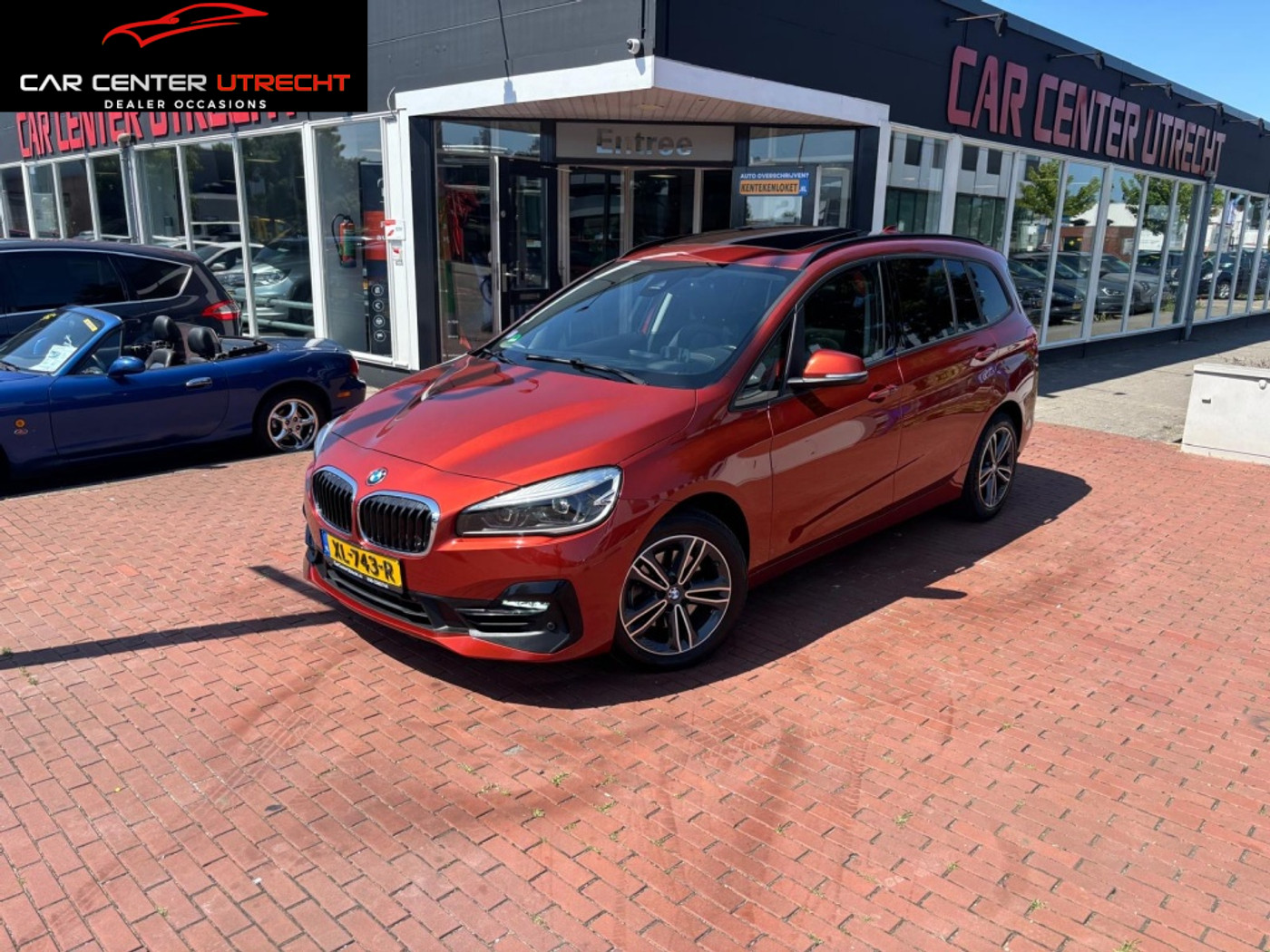 BMW 218i Gran Tourer 218i High Executive | trekhaak | Full opties | automaat | 2019 - voorkant