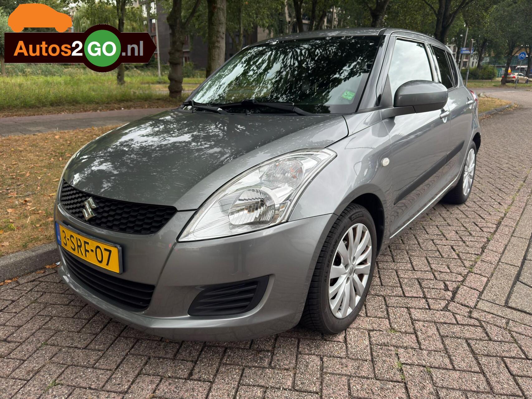 Suzuki Swift 1.2 Business Edition EASSS I Airco I Multi media scherm I rijklaar I 2013 - voorkant