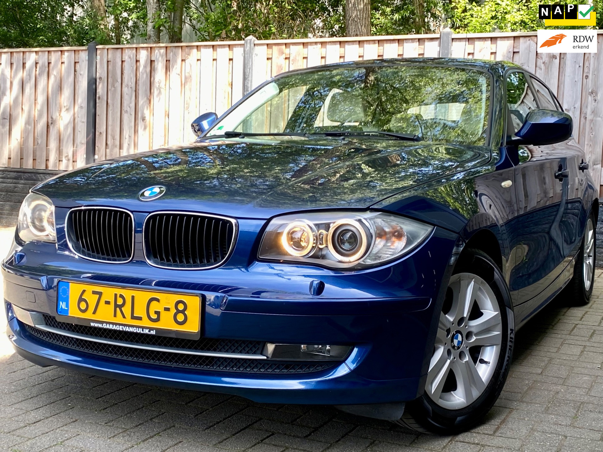 BMW 116i 116i Business Line Ultimate Edition NL Auto I APK I NAVI I AUTOMAAT I LEER I CRUISE I LMV 2011 - voorkant