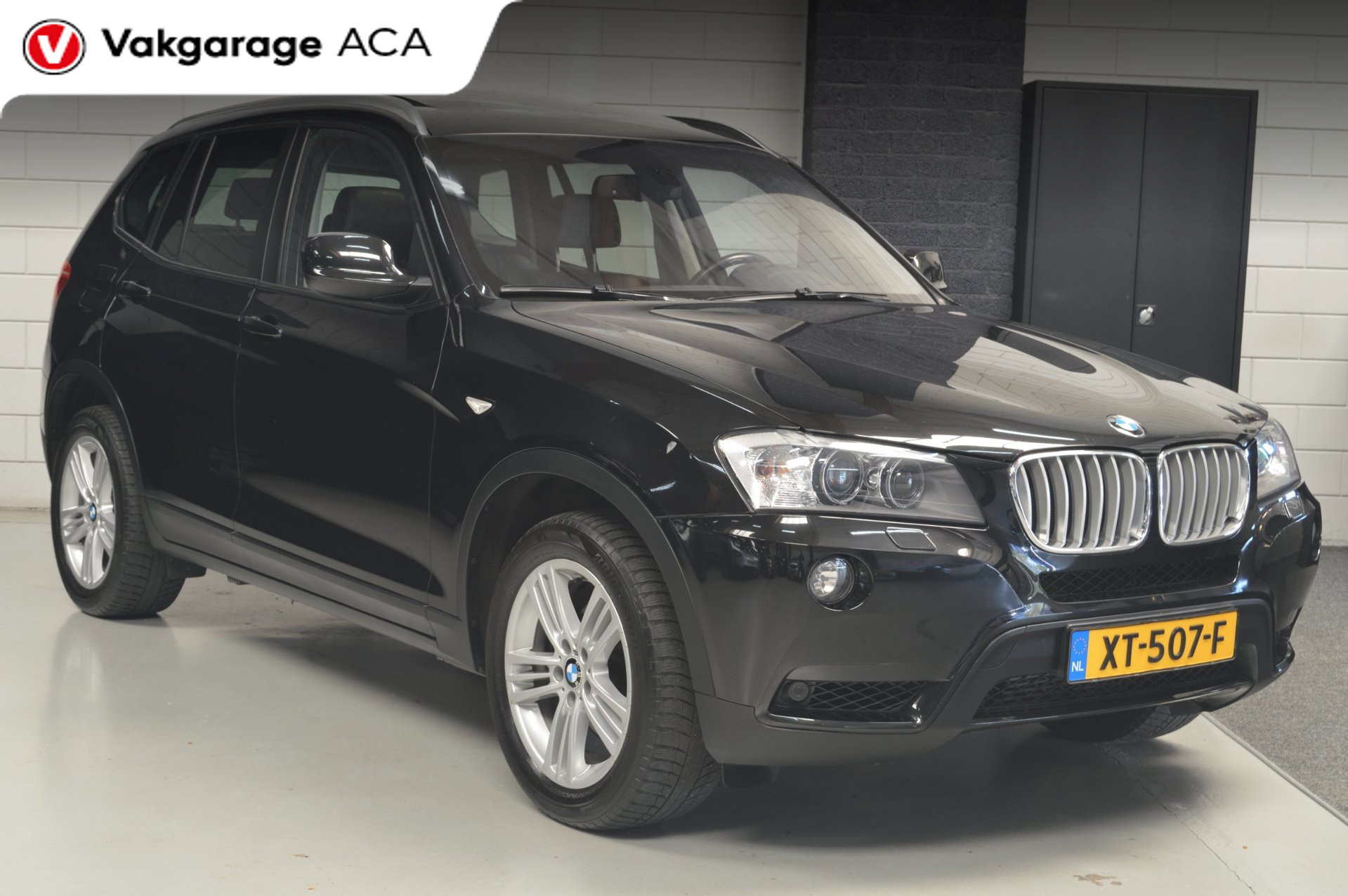 BMW X Series XDrive35i High Executive // 145.000 km // PANORAMADAK // LEDER // NAVI // CLIMA // 2010 - voorkant