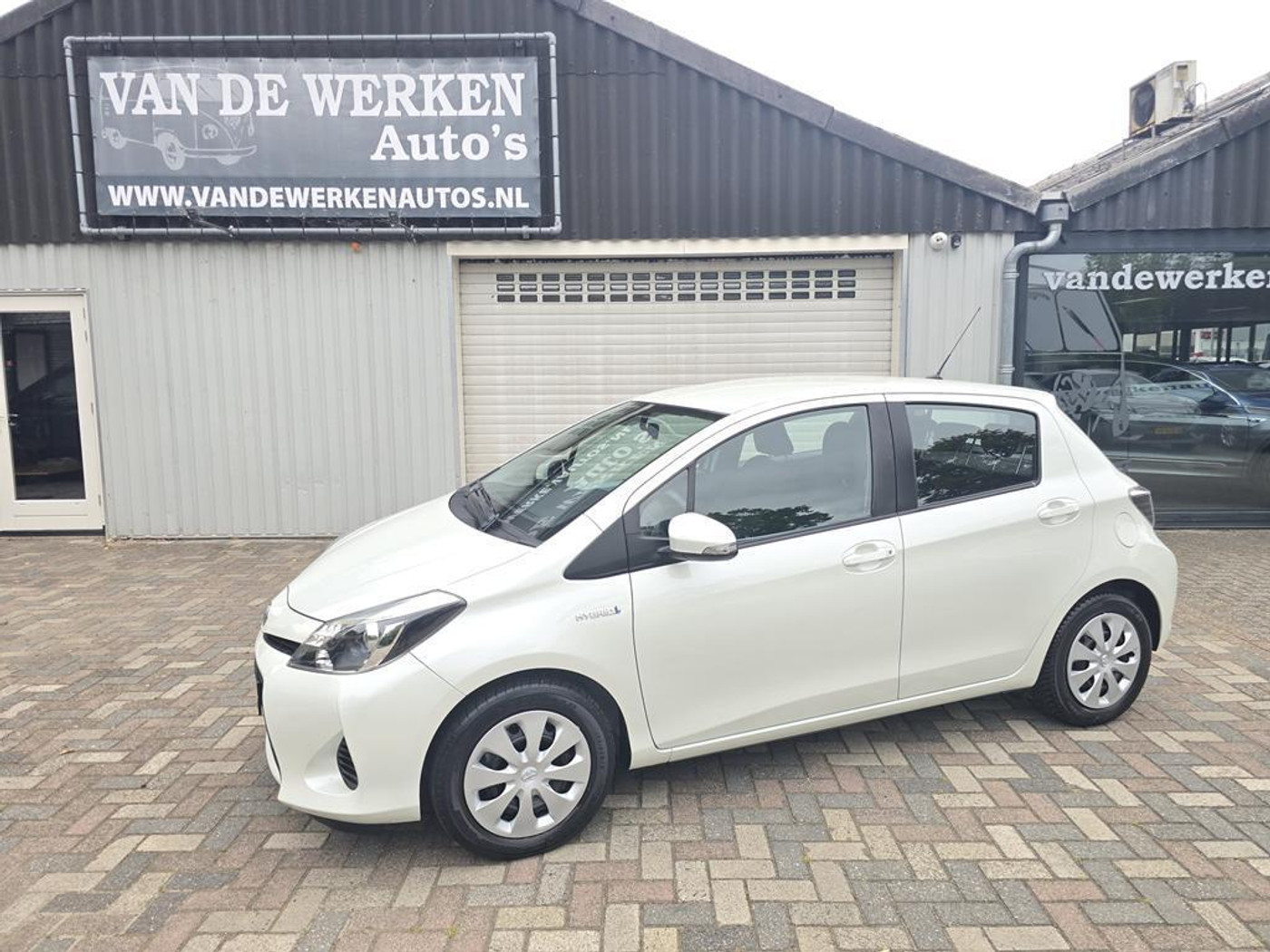 Toyota Toyota Yaris Hybrid 1.5 Full Hybrid Aspiration AUTOMAAT Clima|Cruise|Camera|Nap!! 2013 - voorkant