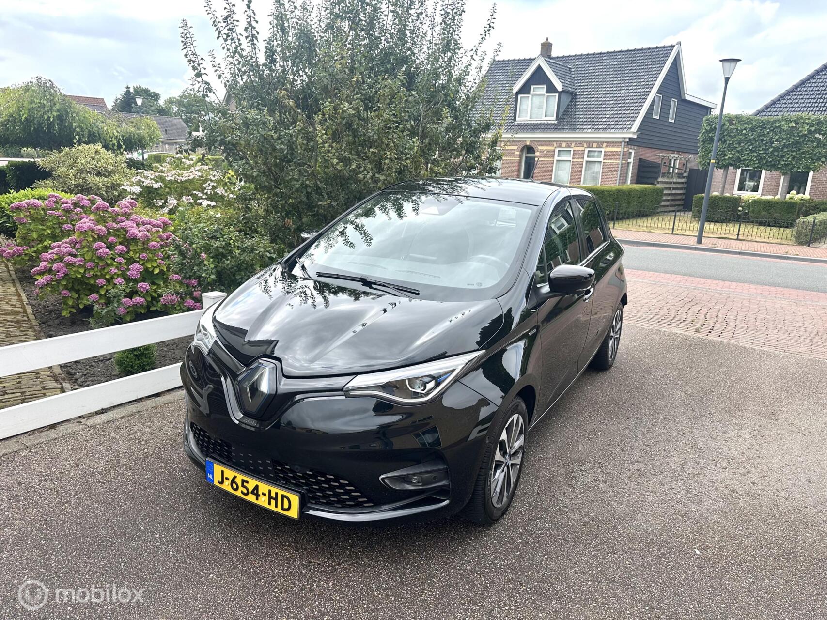 Renault Zoe R135 Edition One 52 kWh KOOPACCU WARMTEPOMP CAMERA NAVIGATIE BOSE AUDIO BLINDSPOT ZEER LUXE UITVOERING!! 2020 - voorkant