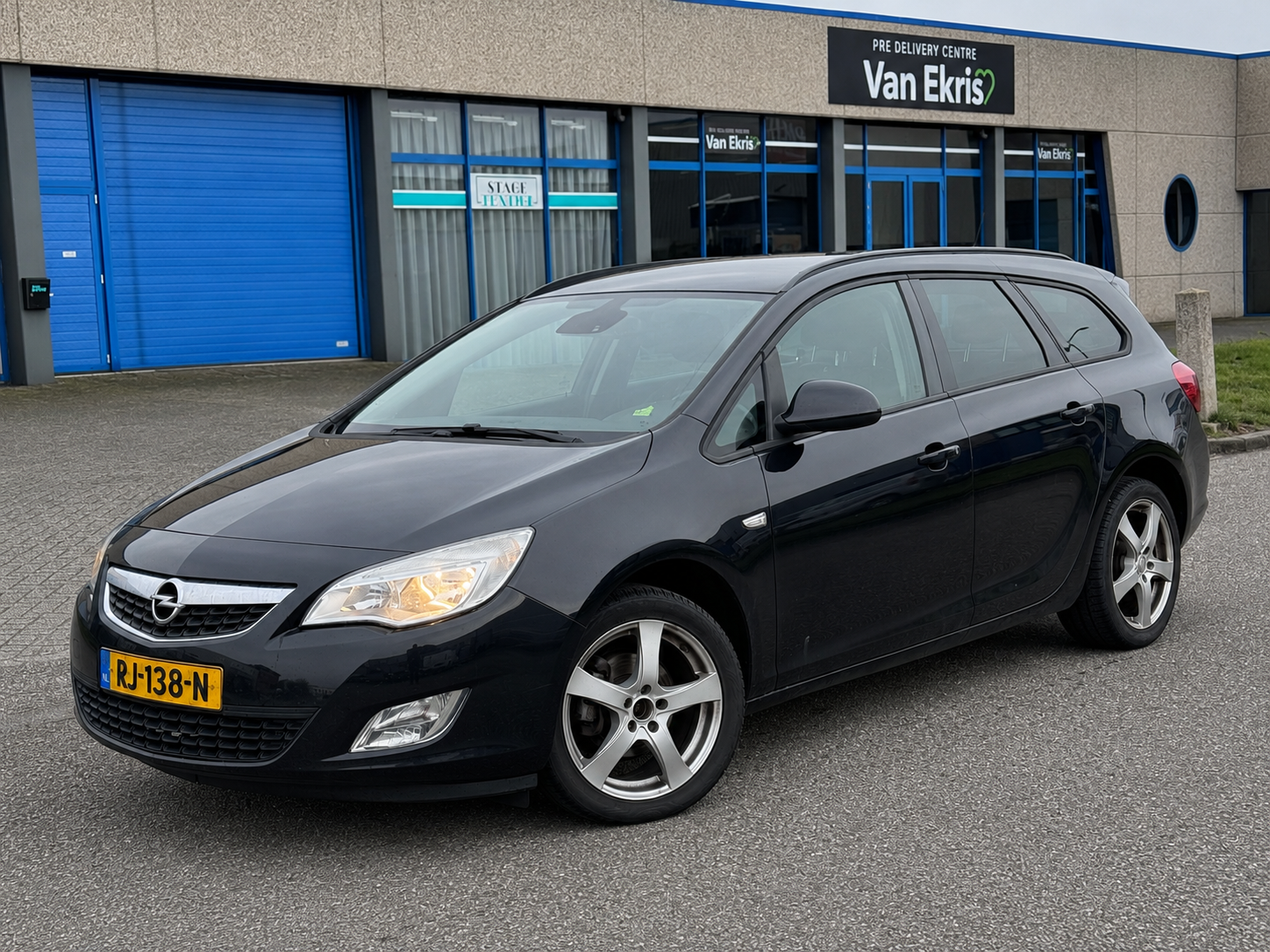 Opel Astra Sports Tourer 1.4 Turbo Edition 6-BAK Airco 2011 - voorkant