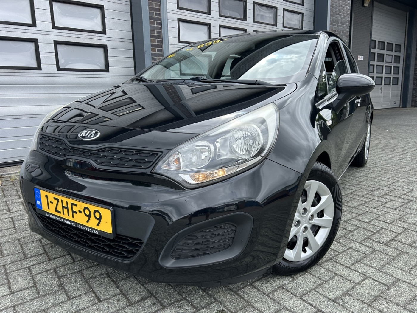 Kia Rio 1.2 CVVT Comfort 5DRS Airco Rijdt TOP! NAP 2015 - voorkant