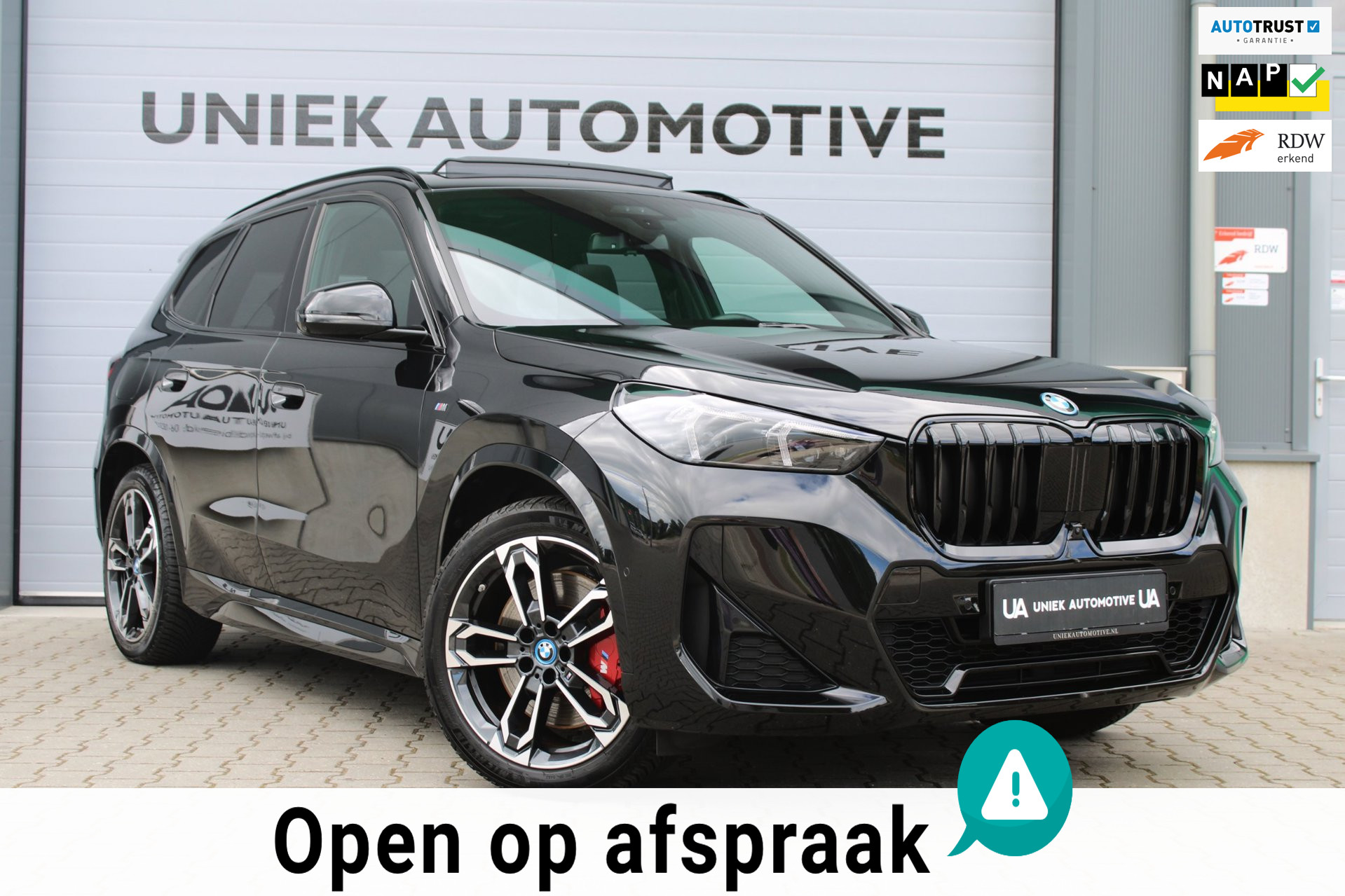 BMW X1 Xdrive30e XDRIVE 30e M SPORT | PANO | TREKHAAK | HARMAN KARDON | HEAD UP | 360 CAMERA | 19"| CARPLAY | SFEERVERLICHTING | ACC | 2024 - voorkant
