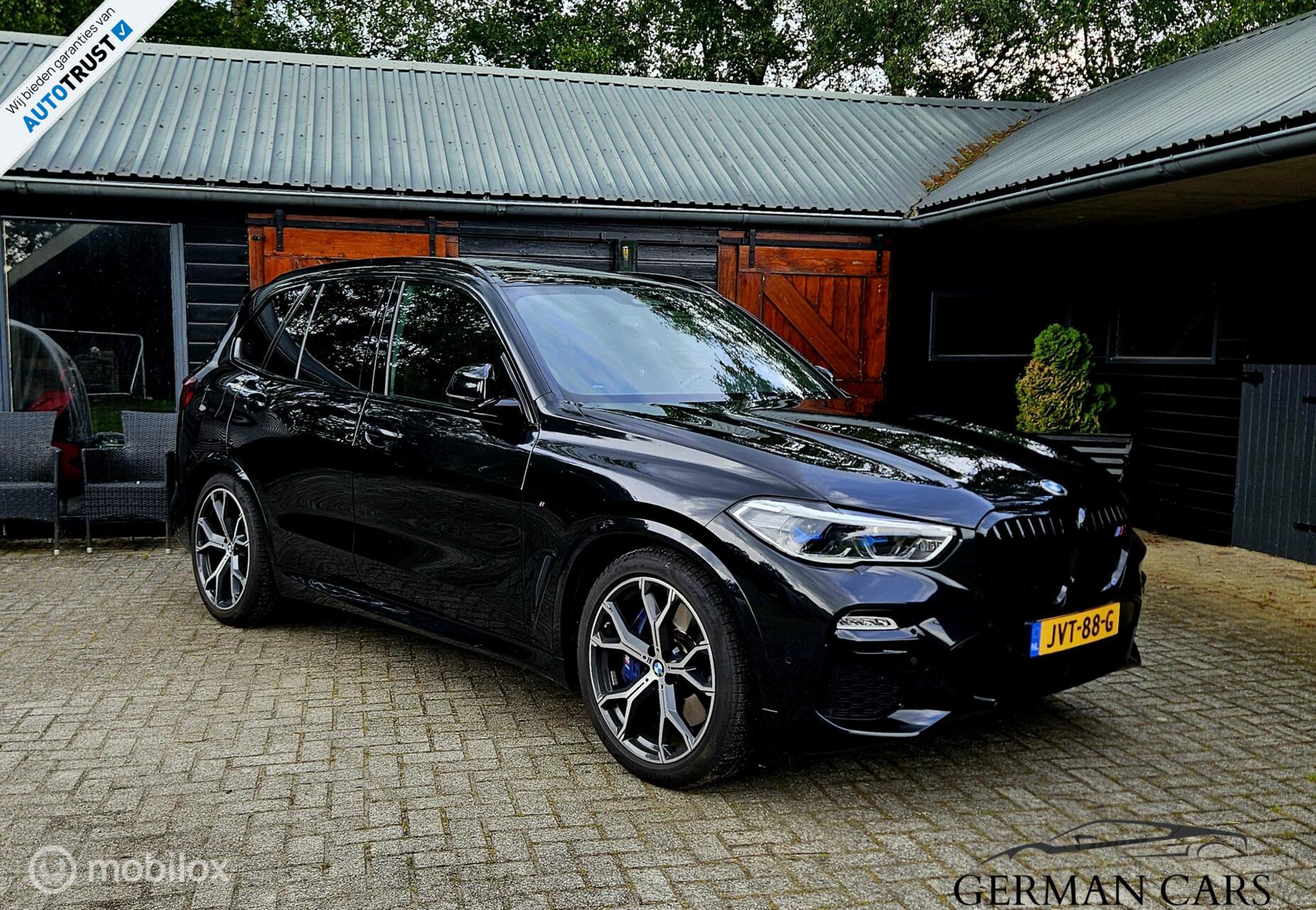 BMW X5 xDrive45E High Executive Hybride 394PK | SKY Lounge 2020 - voorkant
