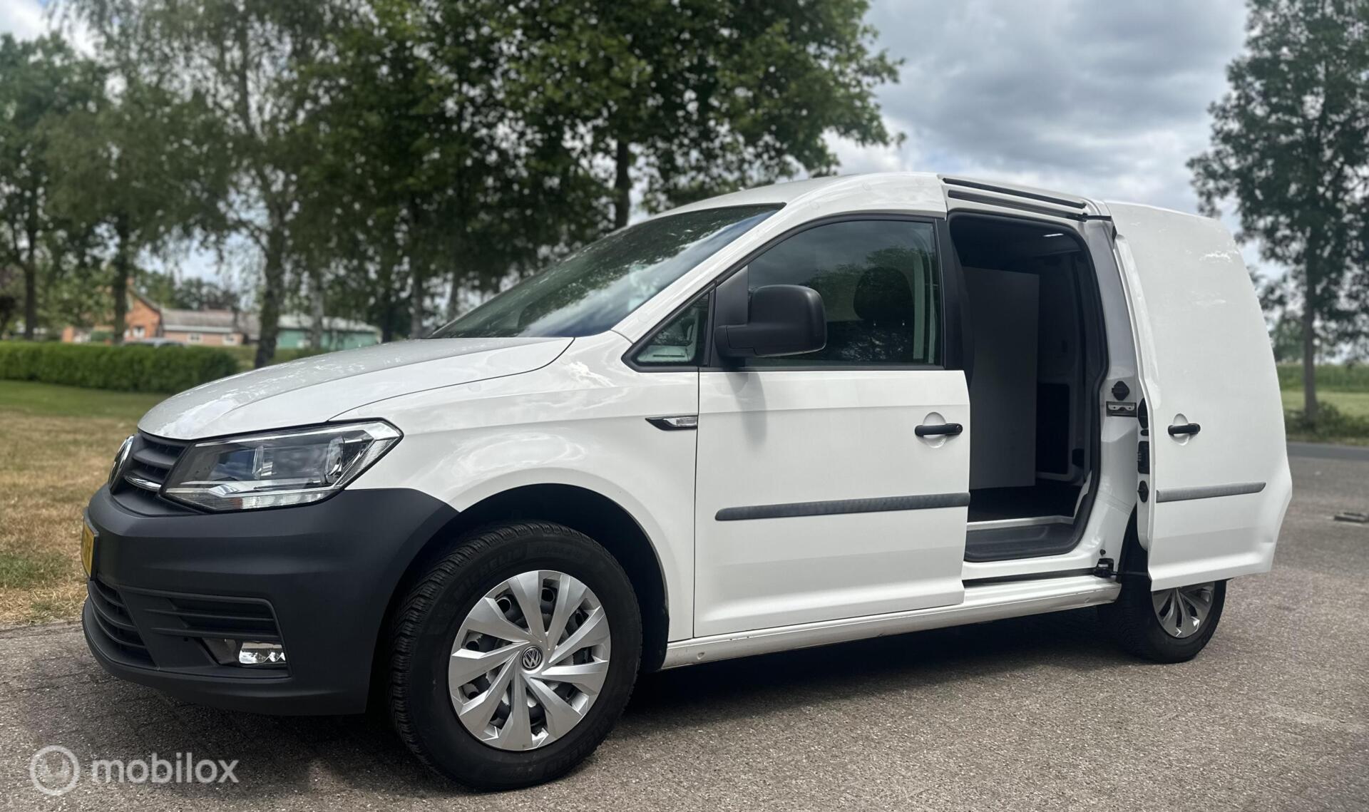 Foto van Volkswagen Caddy Modified Partition Wall