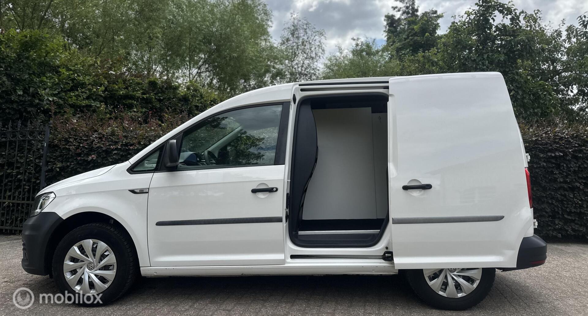 Foto van Volkswagen Caddy Modified Partition Wall