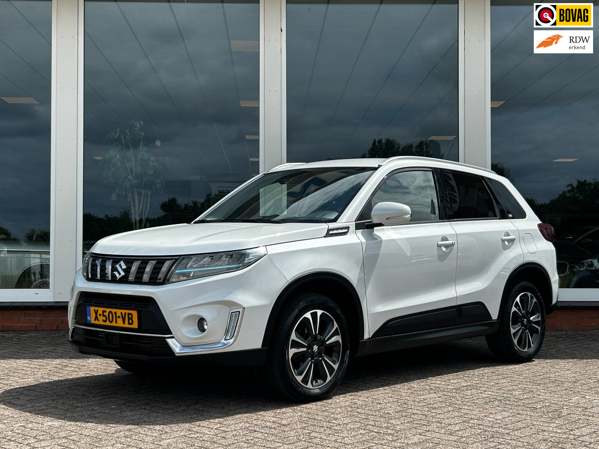 Suzuki Vitara 1.4 Boosterjet Style Smart Hybrid - Navi - Leder - PDC - Camera 2022 - voorkant