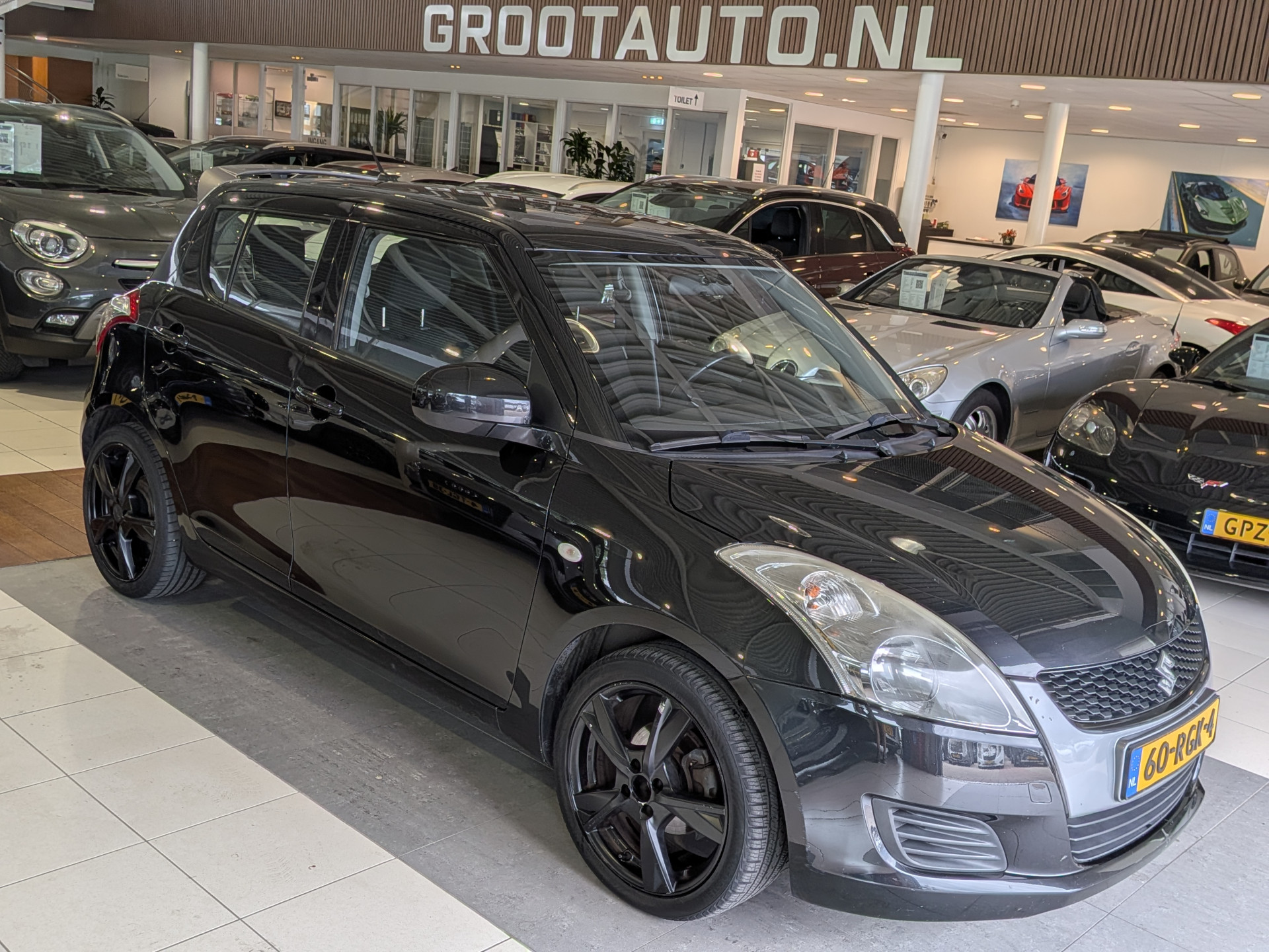 Suzuki Swift 1.2 Comfort EASSS 2011 - voorkant