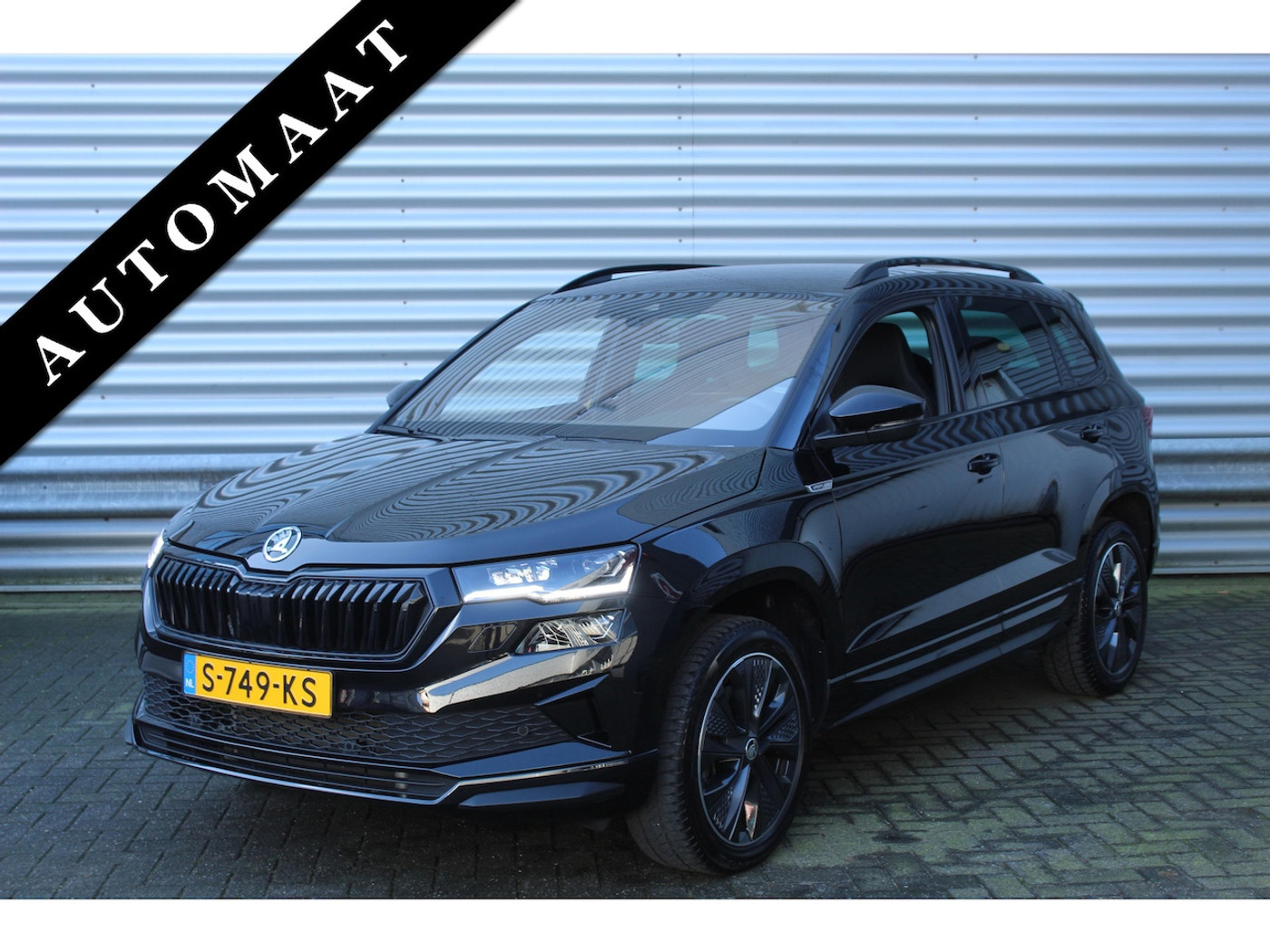 Skoda Karoq 1.5 TSI 150pk Sportline Business DSG7 NL-Auto NAP 2023 - voorkant
