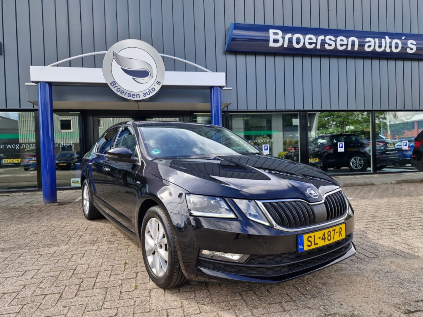Skoda Octavia 1.0 TSI Ambition Business | 116PK | Navigatie | Camera | Cruise Control | 2018 - voorkant