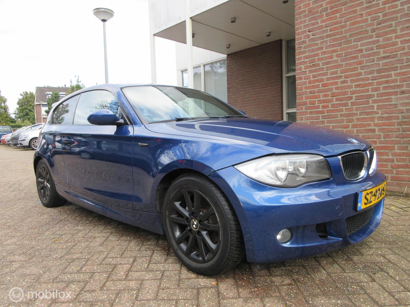 BMW 1er Reihe 116i Corporate 2009 - voorkant
