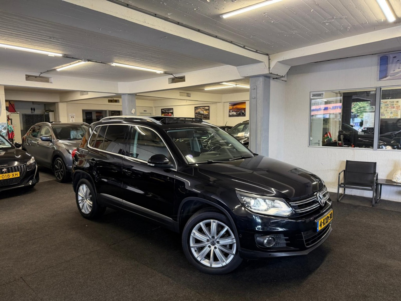 Volkswagen Tiguan 2.0 TSI Sport&St.4M*Schuifdak*Automaat*Keyless 2012 - voorkant