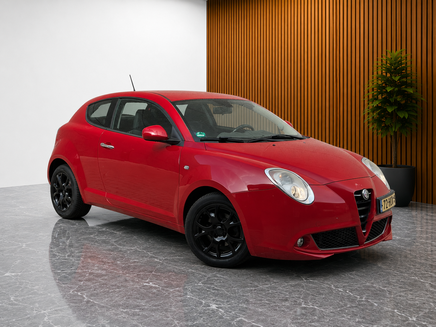 Alfa Romeo Alfa Mito 1.4 T Distinctive (AIRCO, CRUISE CONTROL, DNA, ELEKT RAMEN, NEDERLANDSE AUTO, ZWARTE VELGEN) 2009 - voorkant
