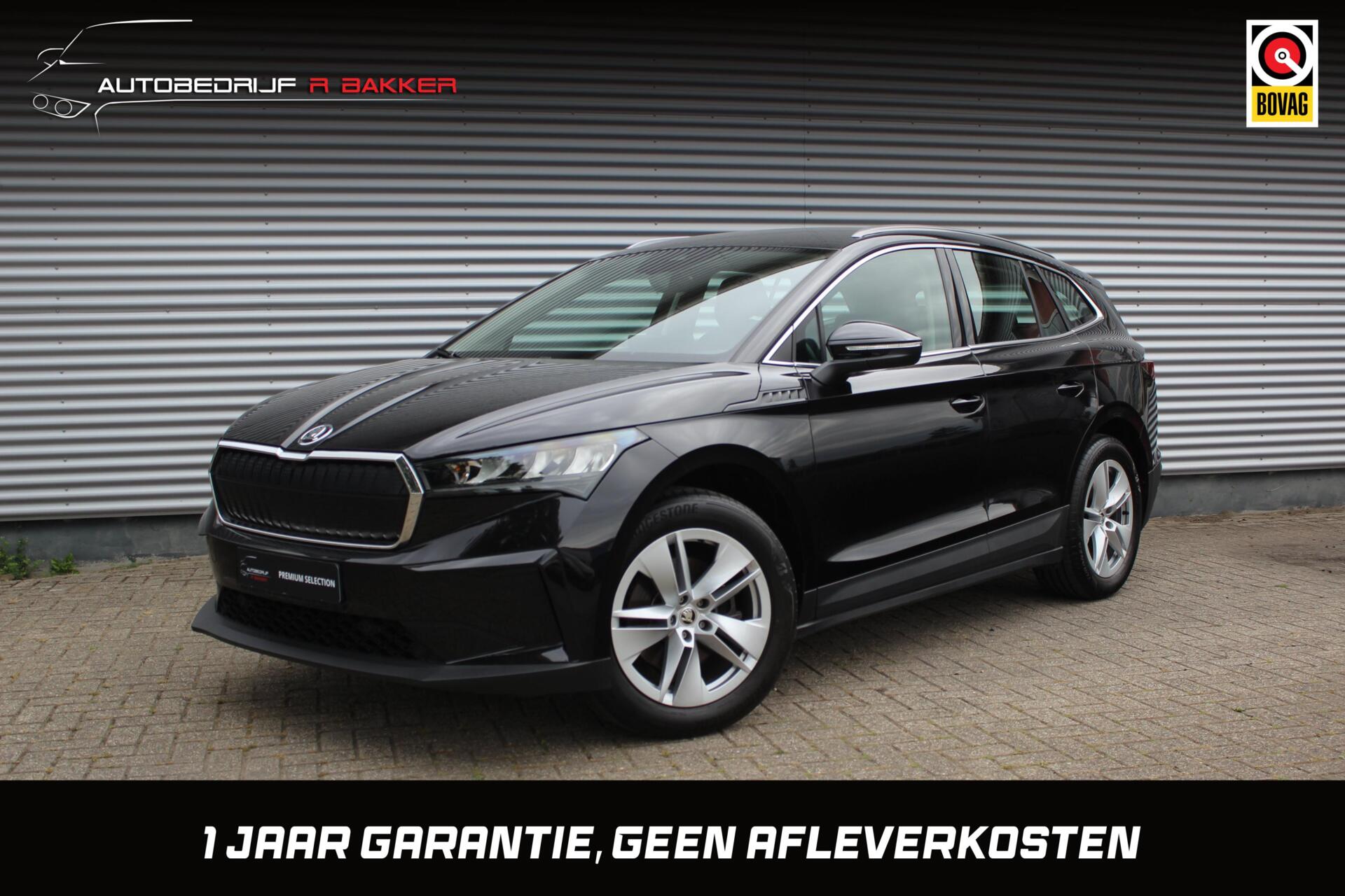 Skoda Enyaq 80 80 Loft // 99% SoH | Dealeronderhouden, 1e eigenaar | Warmtepomp | Camera | Sfeerverlichting | Adap. cruise control | CarPlay & Android Auto 2022 - voorkant