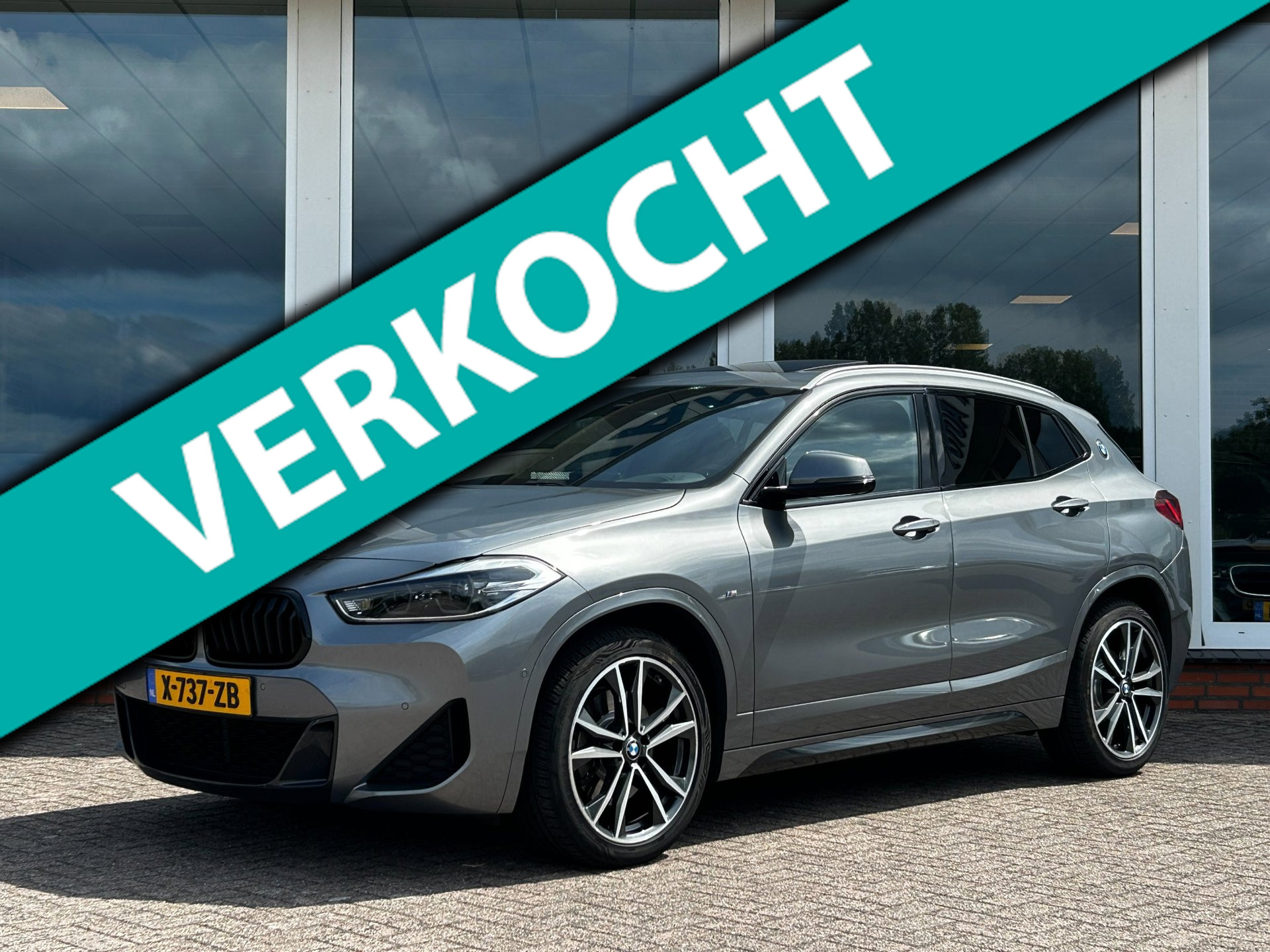 BMW X2 Sdrive20i SDrive20i AUT. - High Executive M-Sport - Panorama - Camera - LM 2022 - voorkant