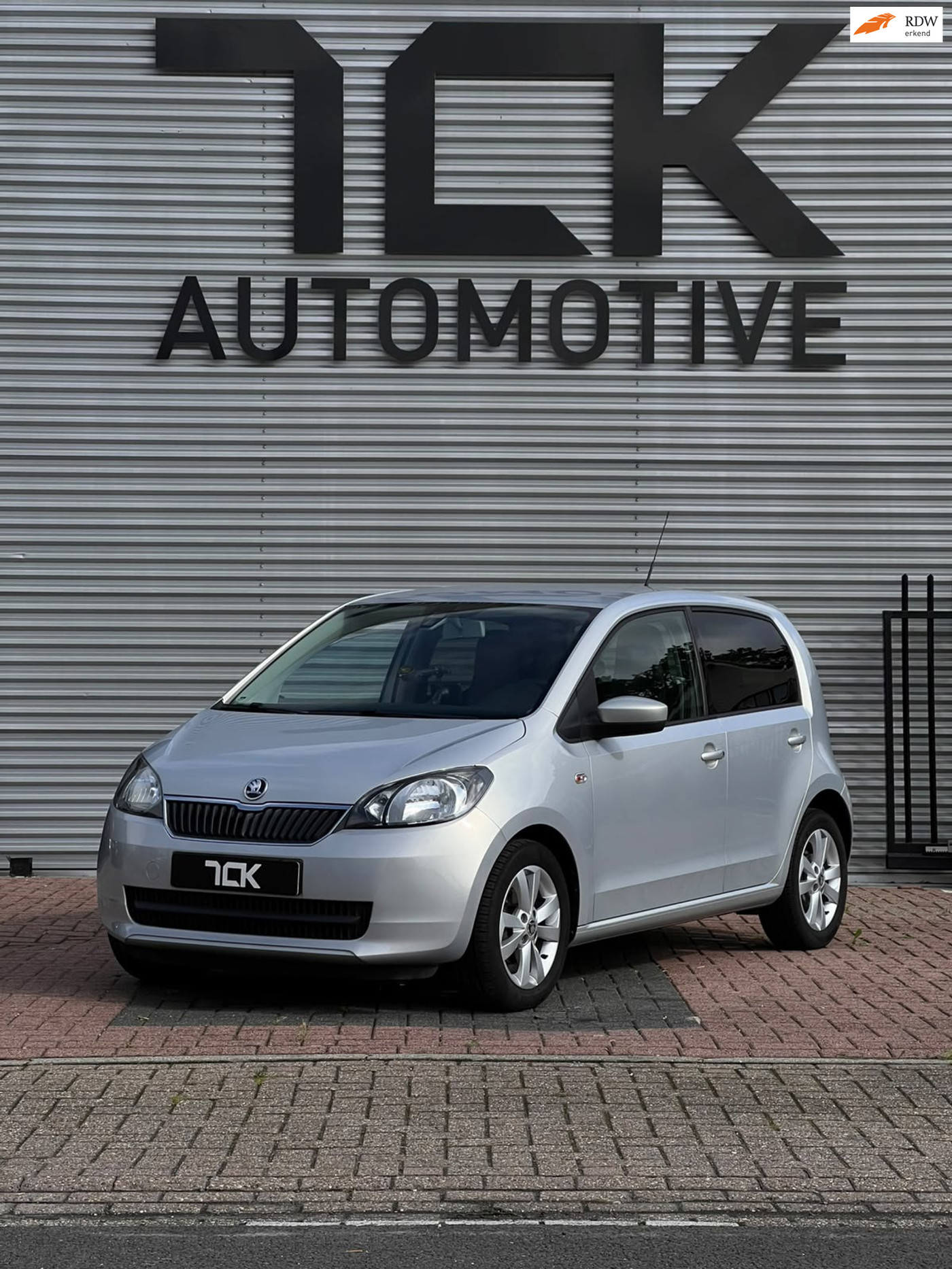 Skoda Citigo 1.0 Ambition APK6-27/AUTOMAAT/AIRCO/CRUISE/NAVI 2013 - voorkant